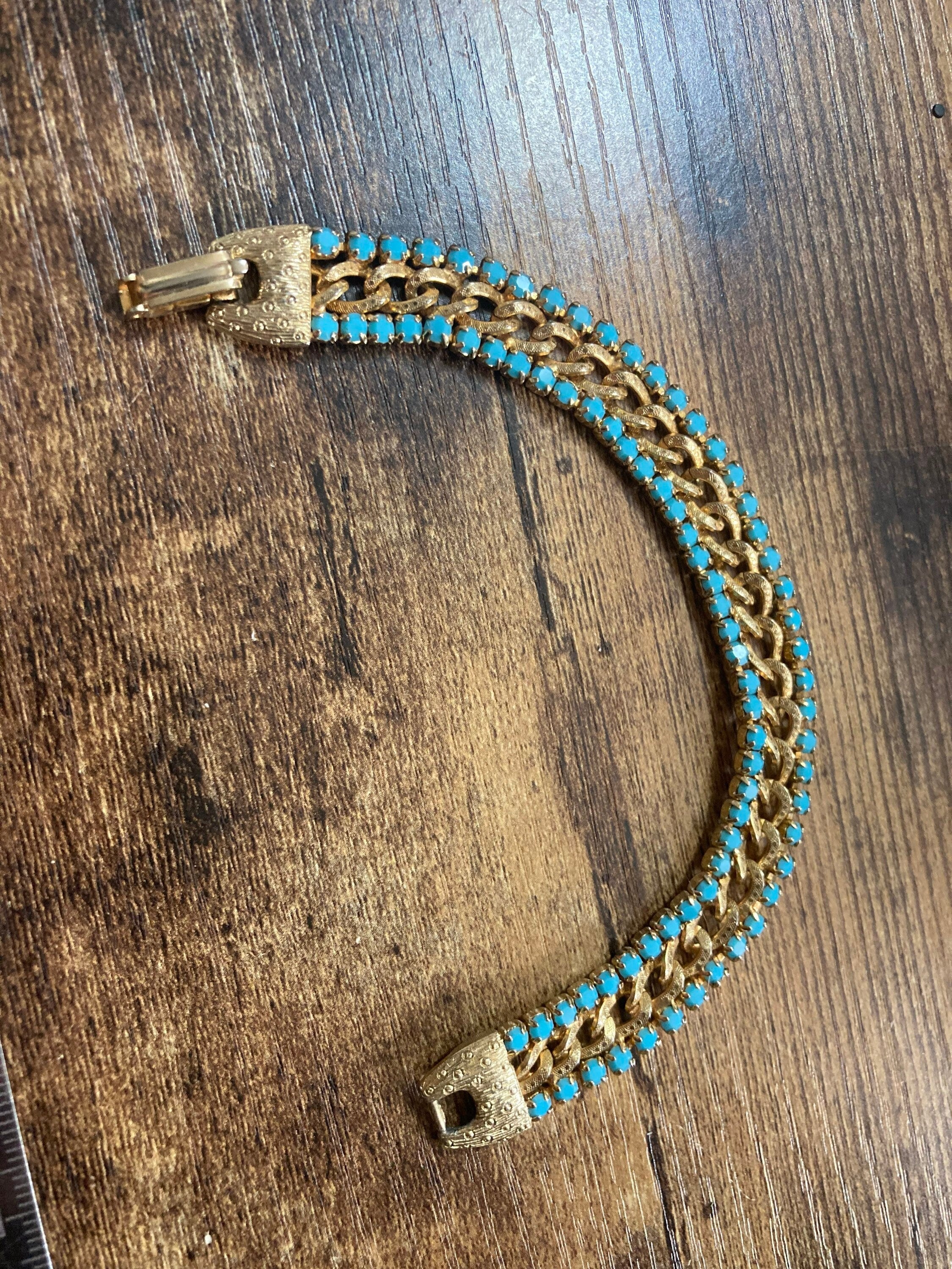 Vintage articulated flat link mesh gold tone bracelet with turquoise blue paste