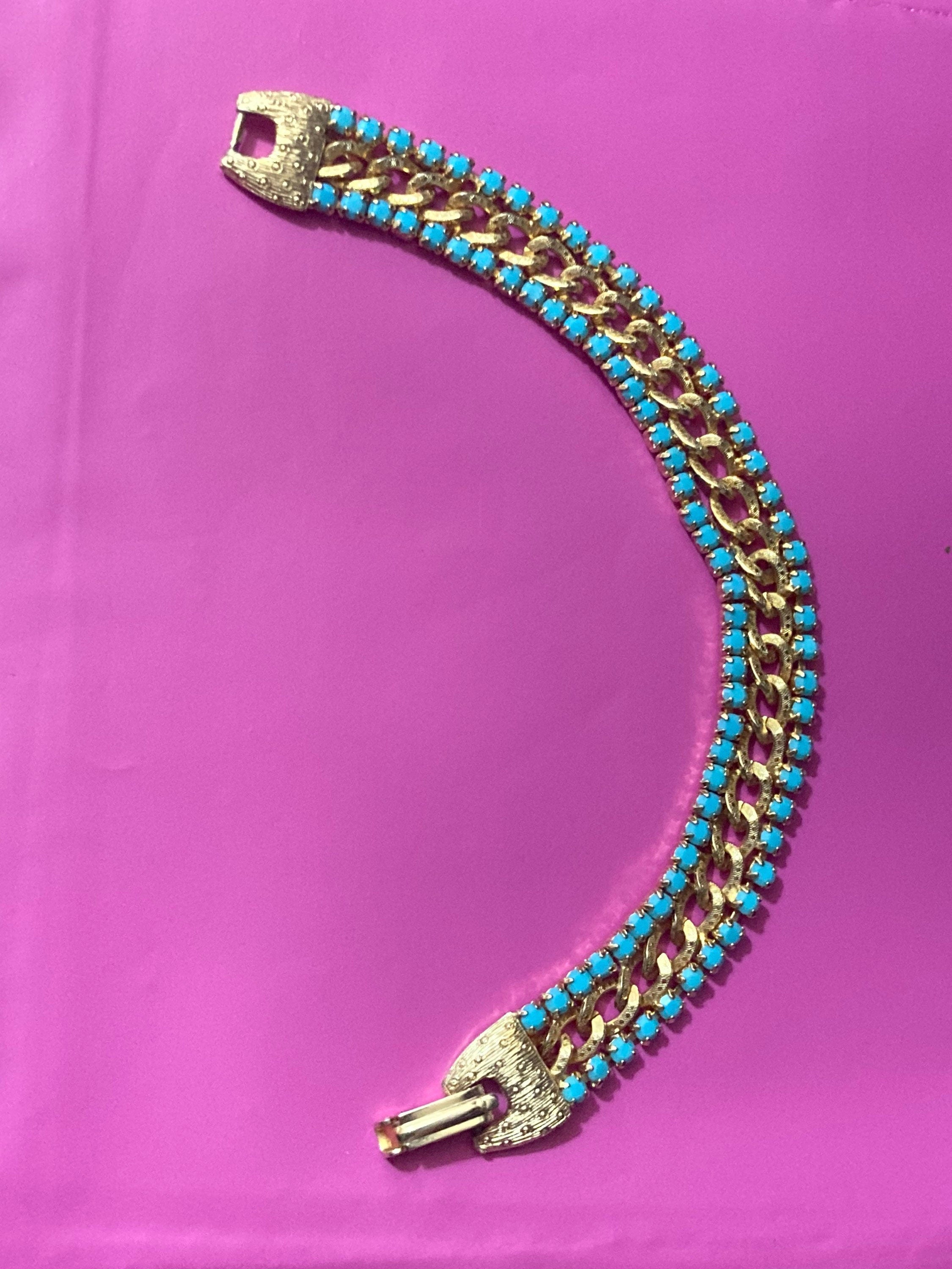 Vintage articulated flat link mesh gold tone bracelet with turquoise blue paste