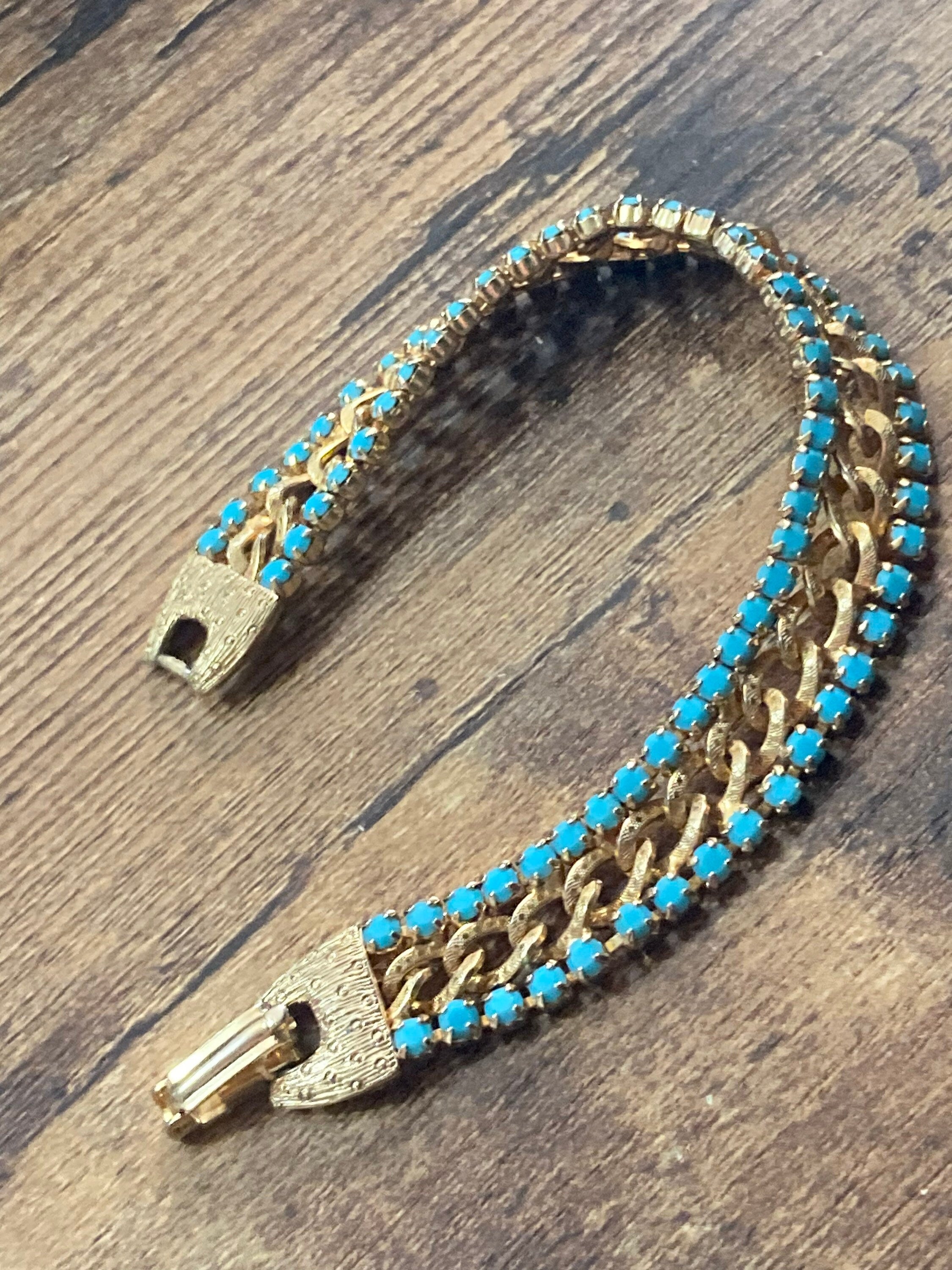 Vintage articulated flat link mesh gold tone bracelet with turquoise blue paste