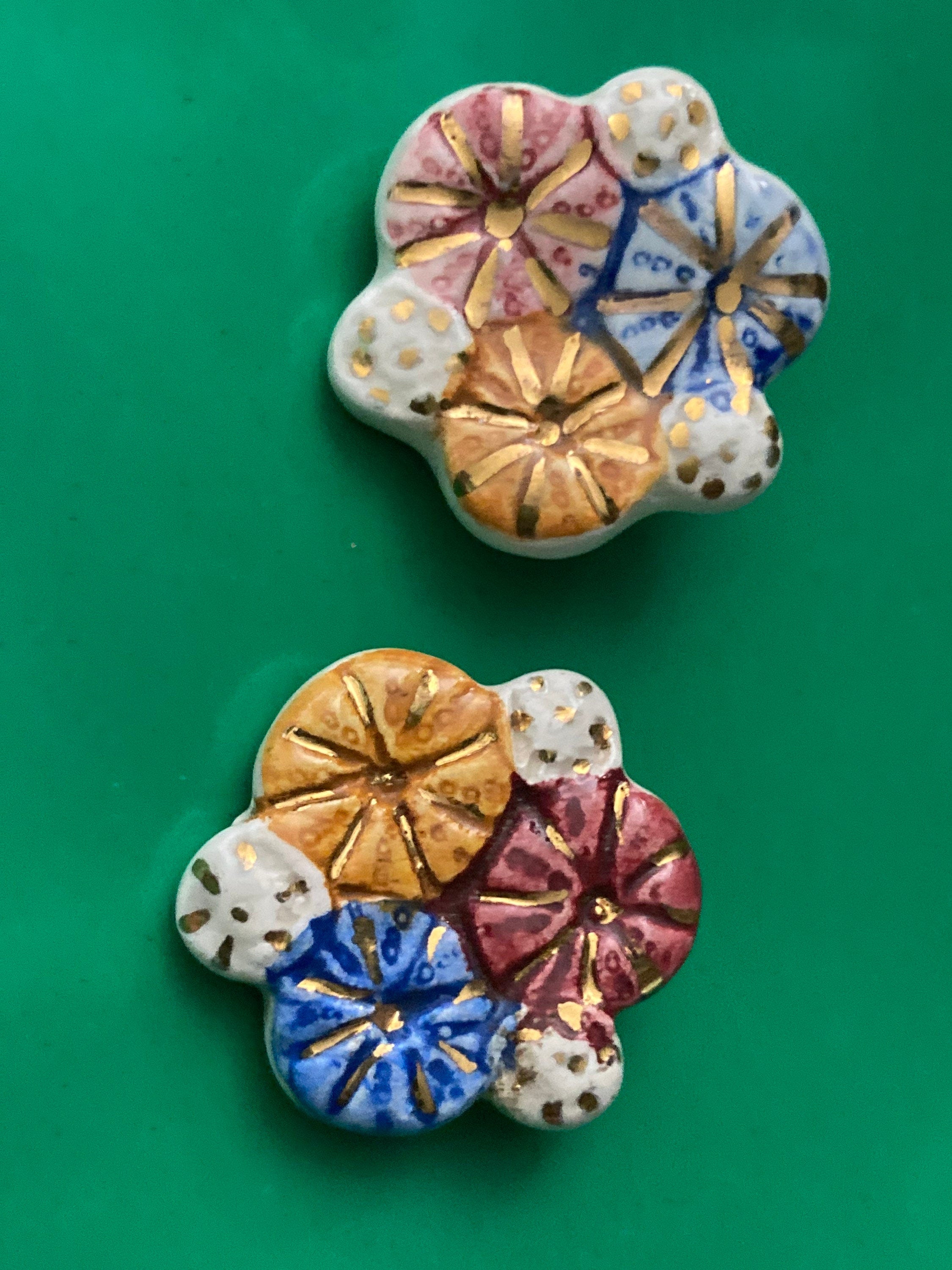 Artisan ceramic pink orange blue glazed floral clip on earrings