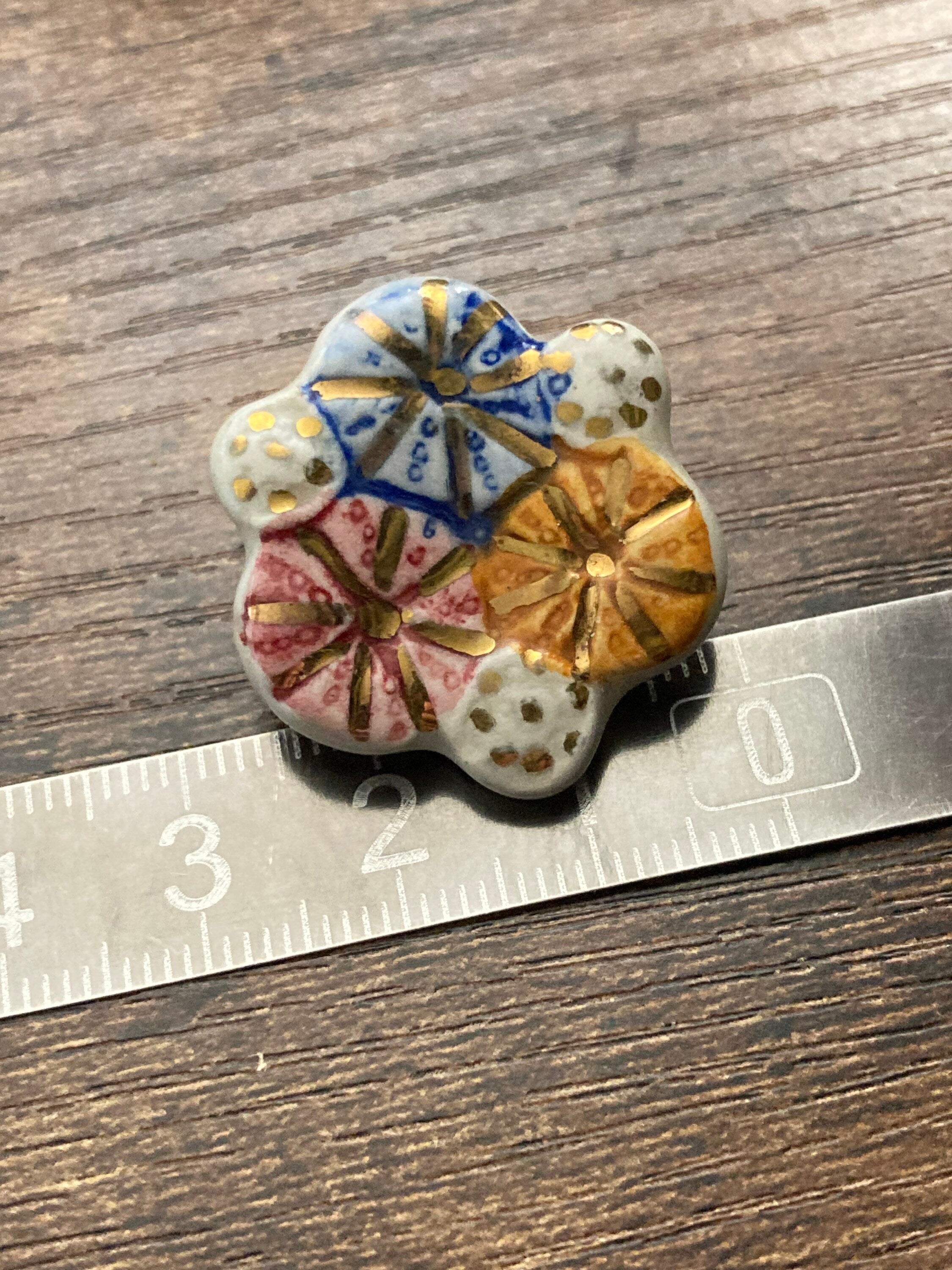 Artisan ceramic pink orange blue glazed floral clip on earrings