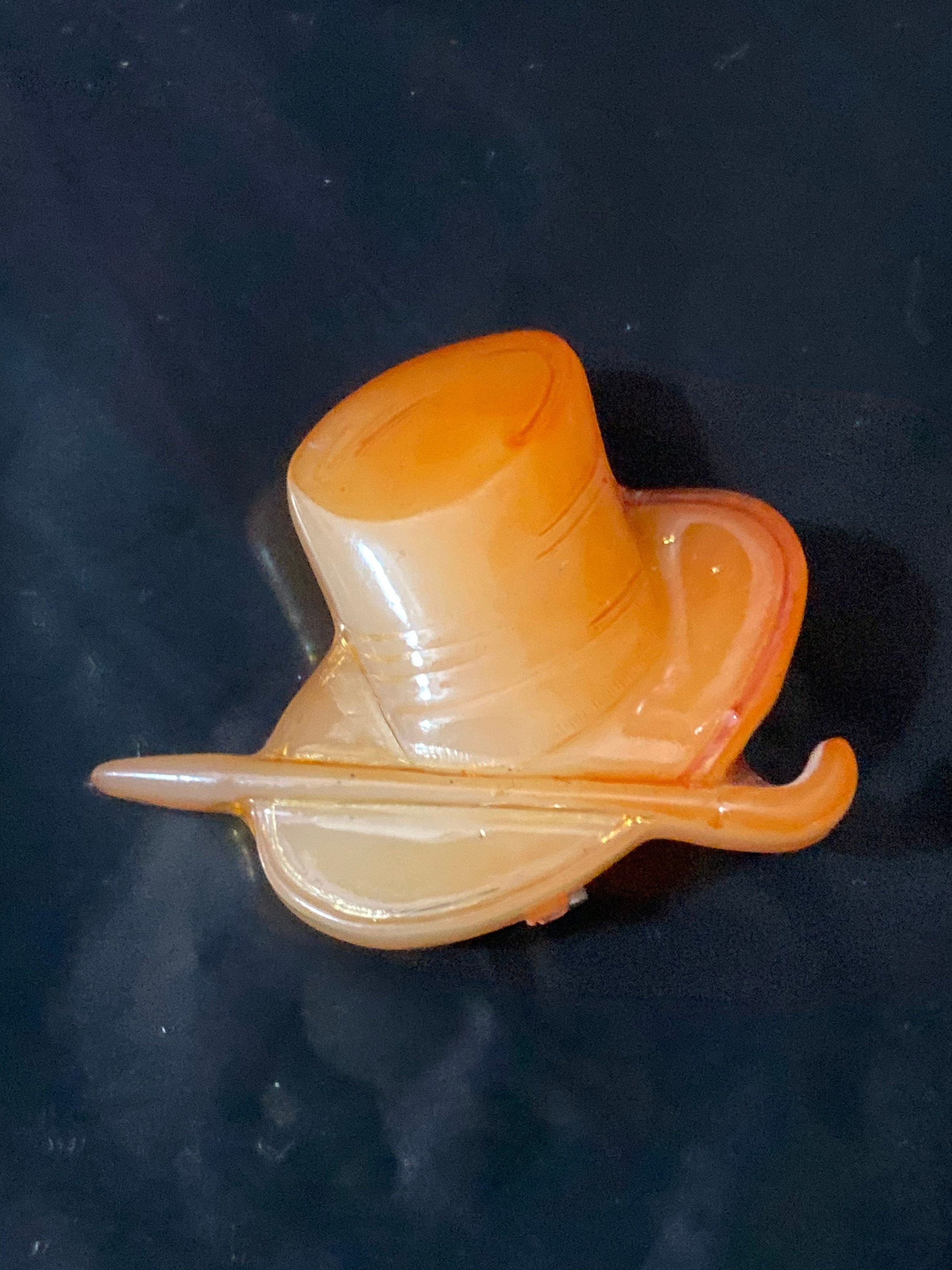 Early Plastic Celluloid Art Deco orange mens top hat and cane brooch