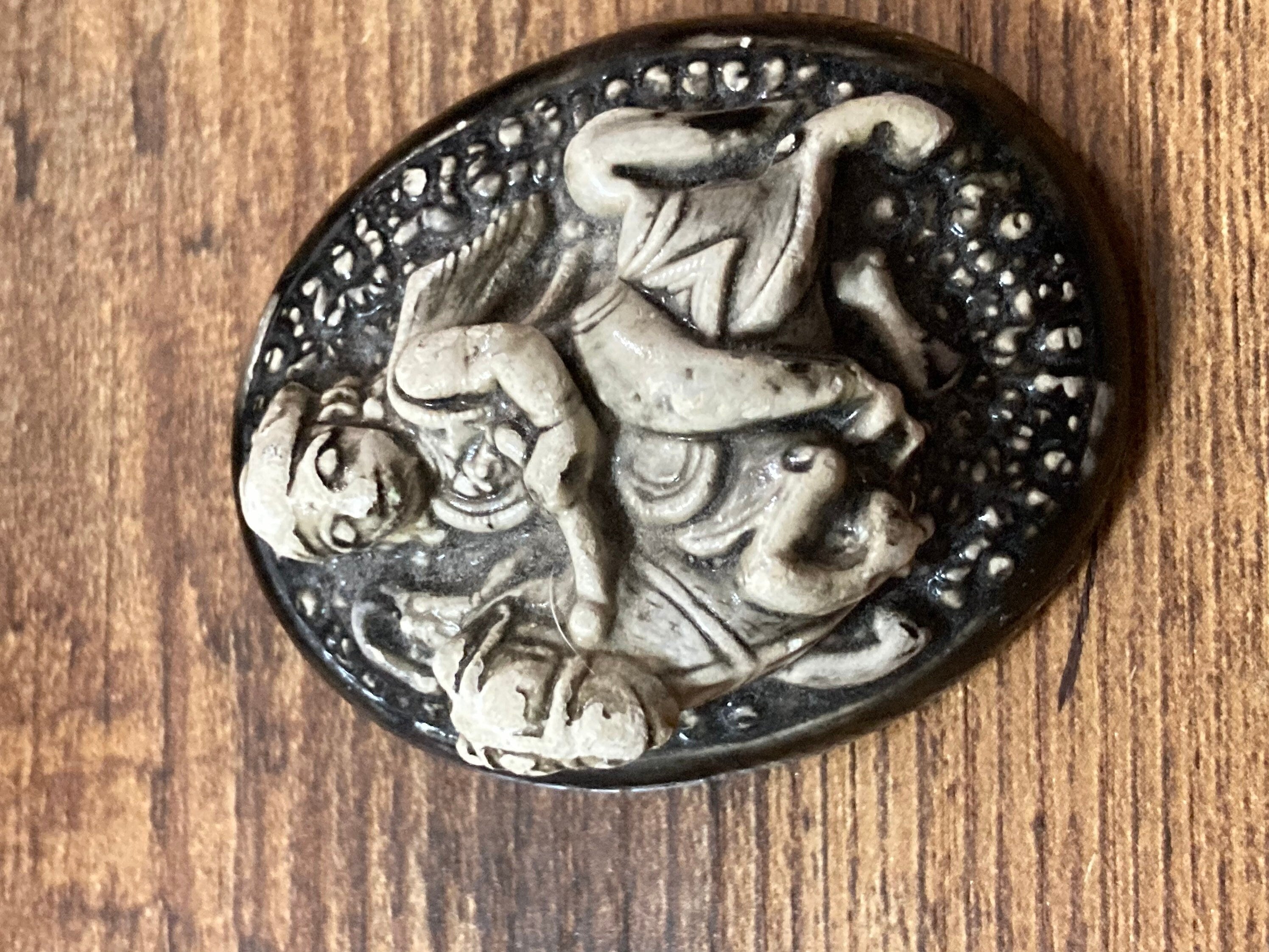 Early Plastic Celluloid Art Deco large Oval man on horse relief brooch St George