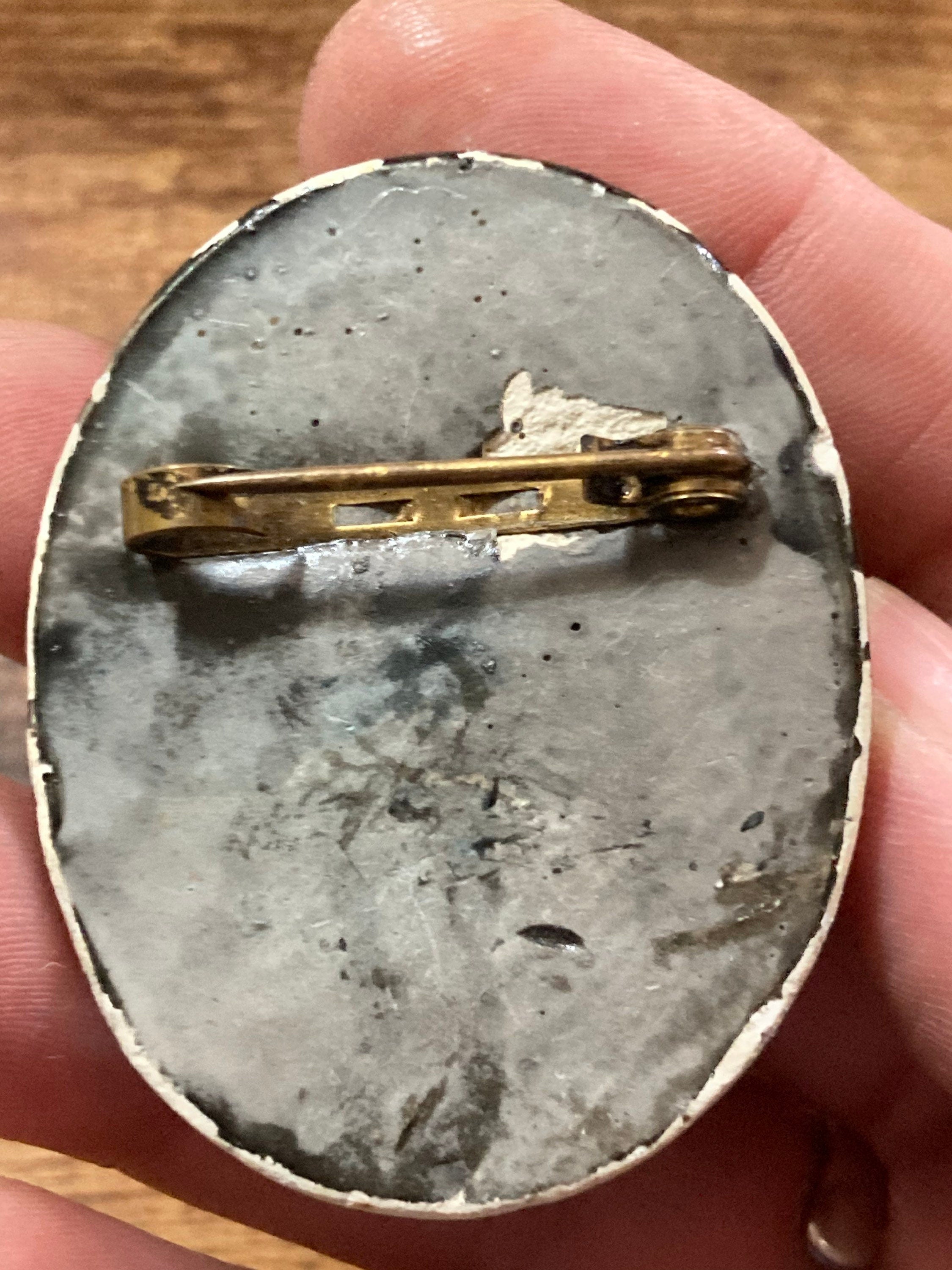 Early Plastic Celluloid Art Deco large Oval man on horse relief brooch St George