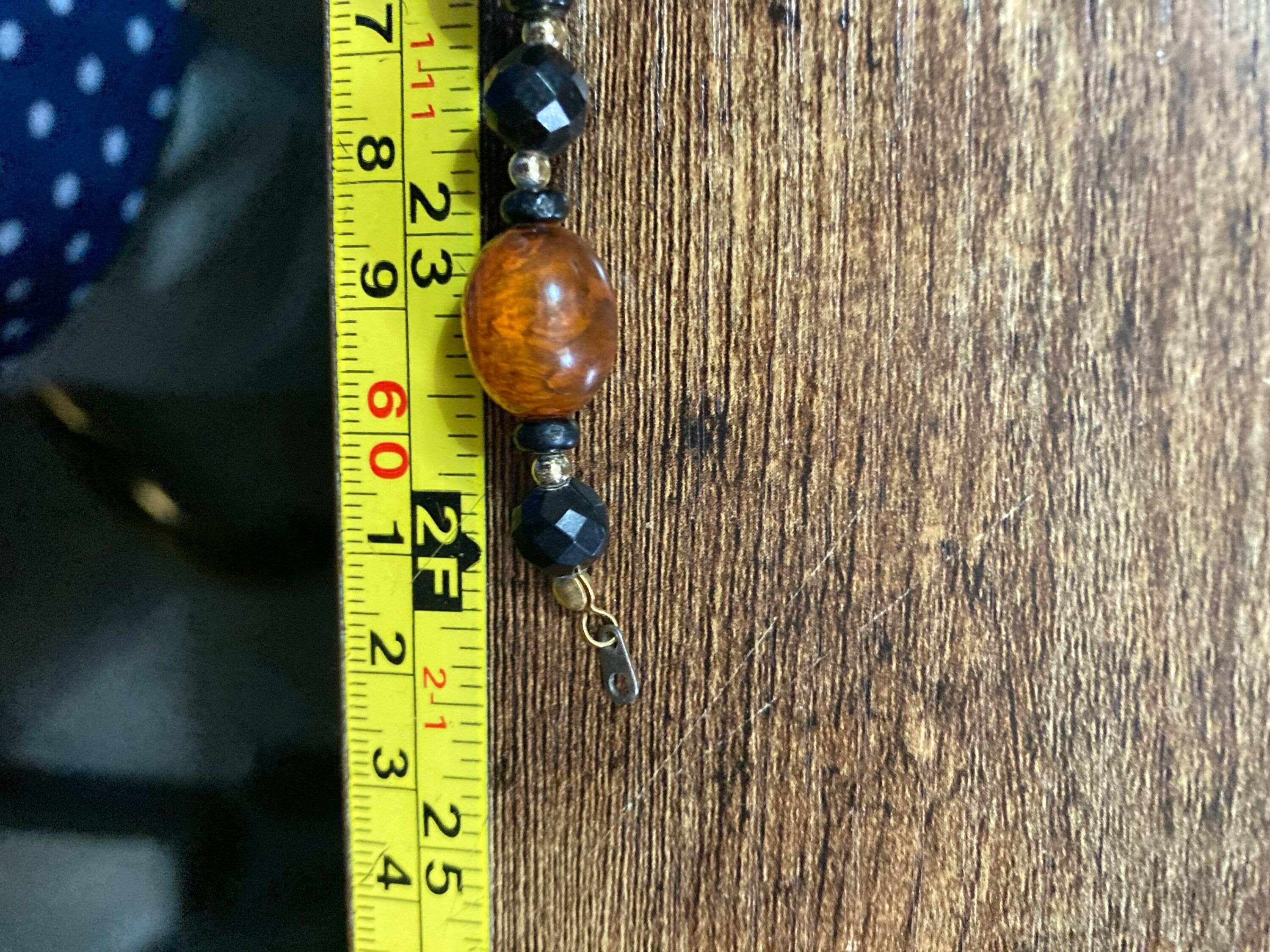 Retro faux amber orange brown  plastic beaded long necklace with black beads