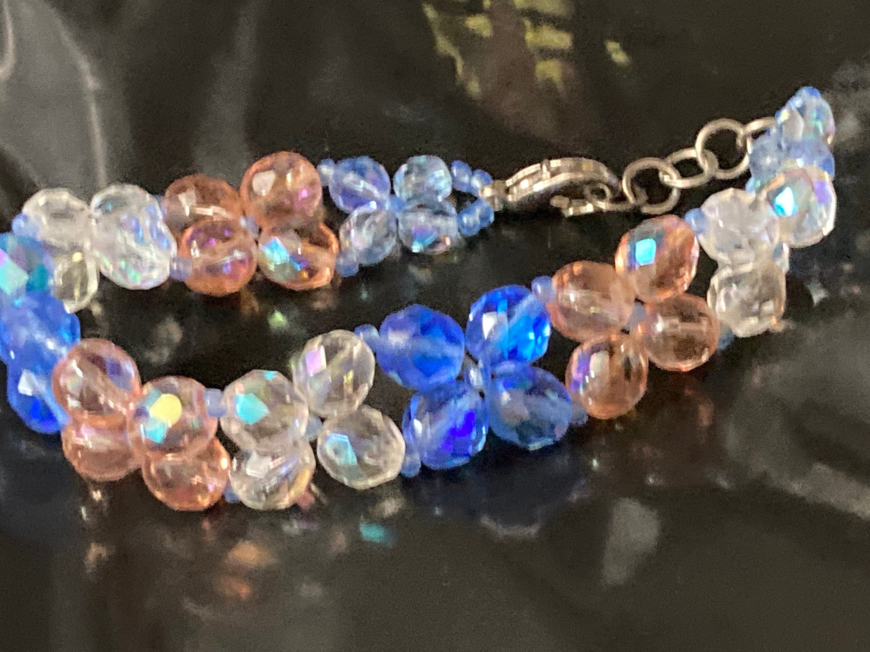 Beautiful 3 row wide blue pink clear AB hues face red glass crystal beaded bracelet perfect for layering