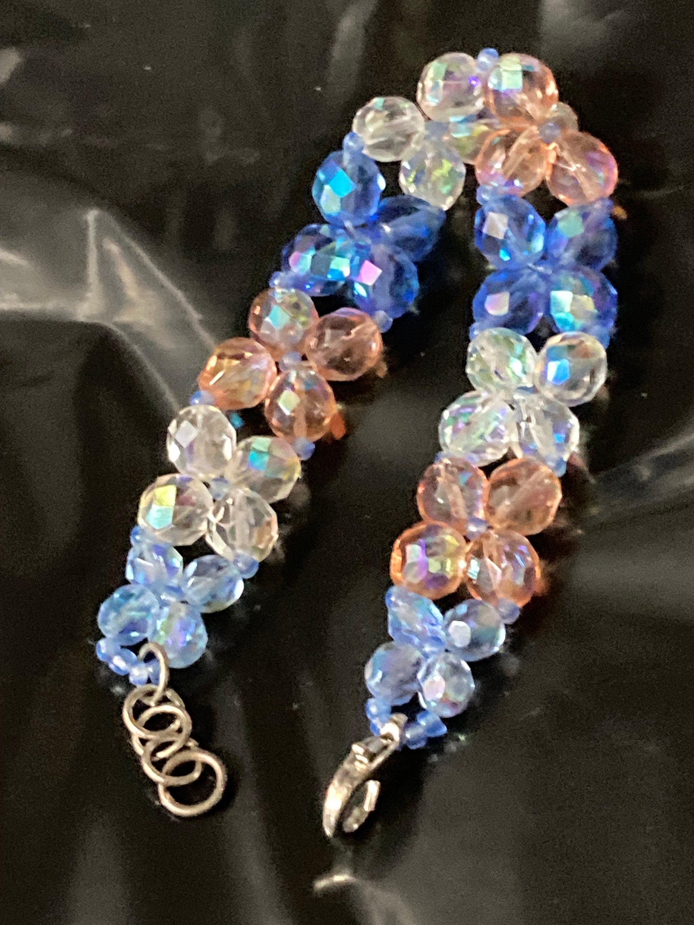 Beautiful 3 row wide blue pink clear AB hues face red glass crystal beaded bracelet perfect for layering