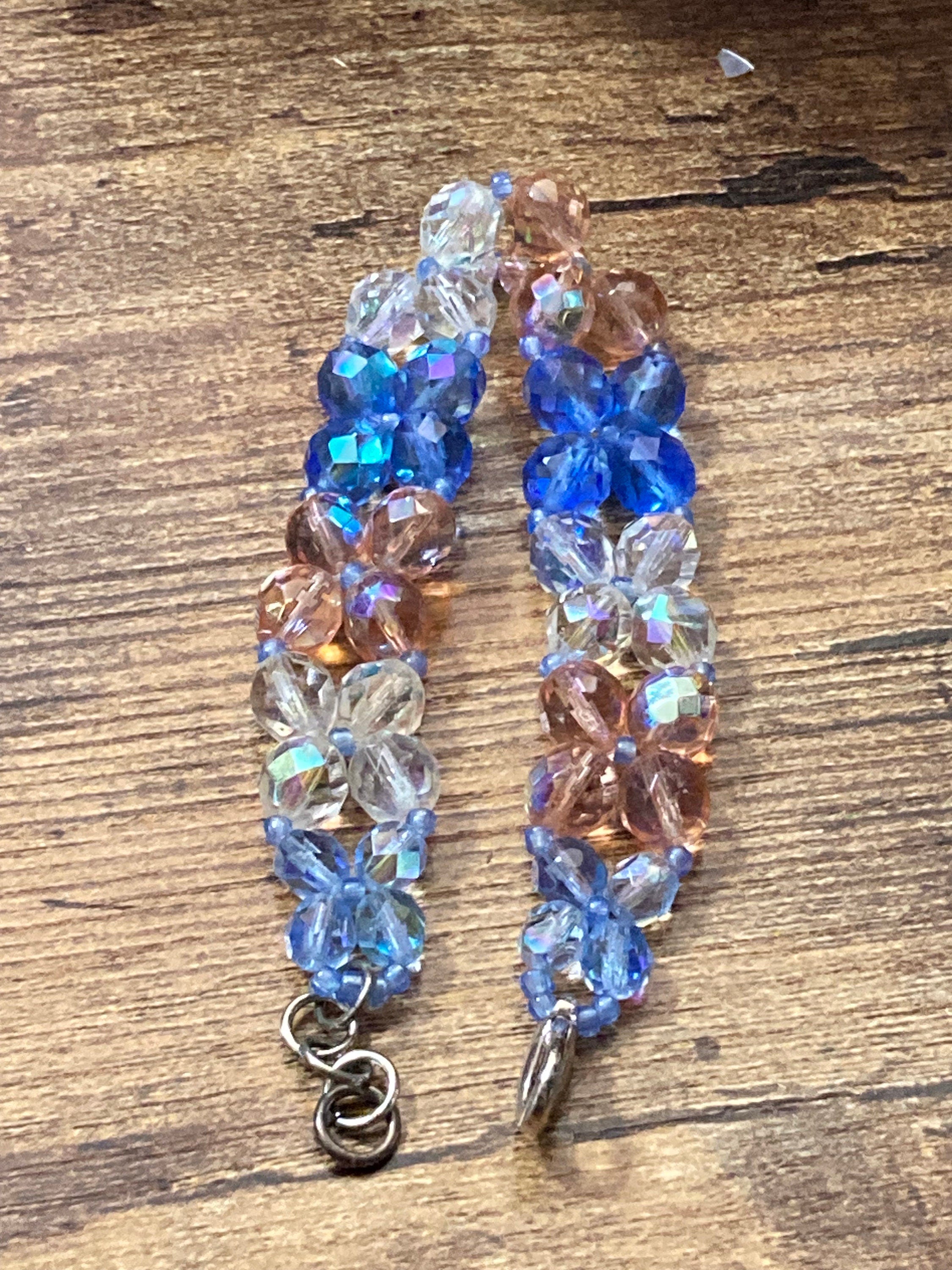 Beautiful 3 row wide blue pink clear AB hues face red glass crystal beaded bracelet perfect for layering
