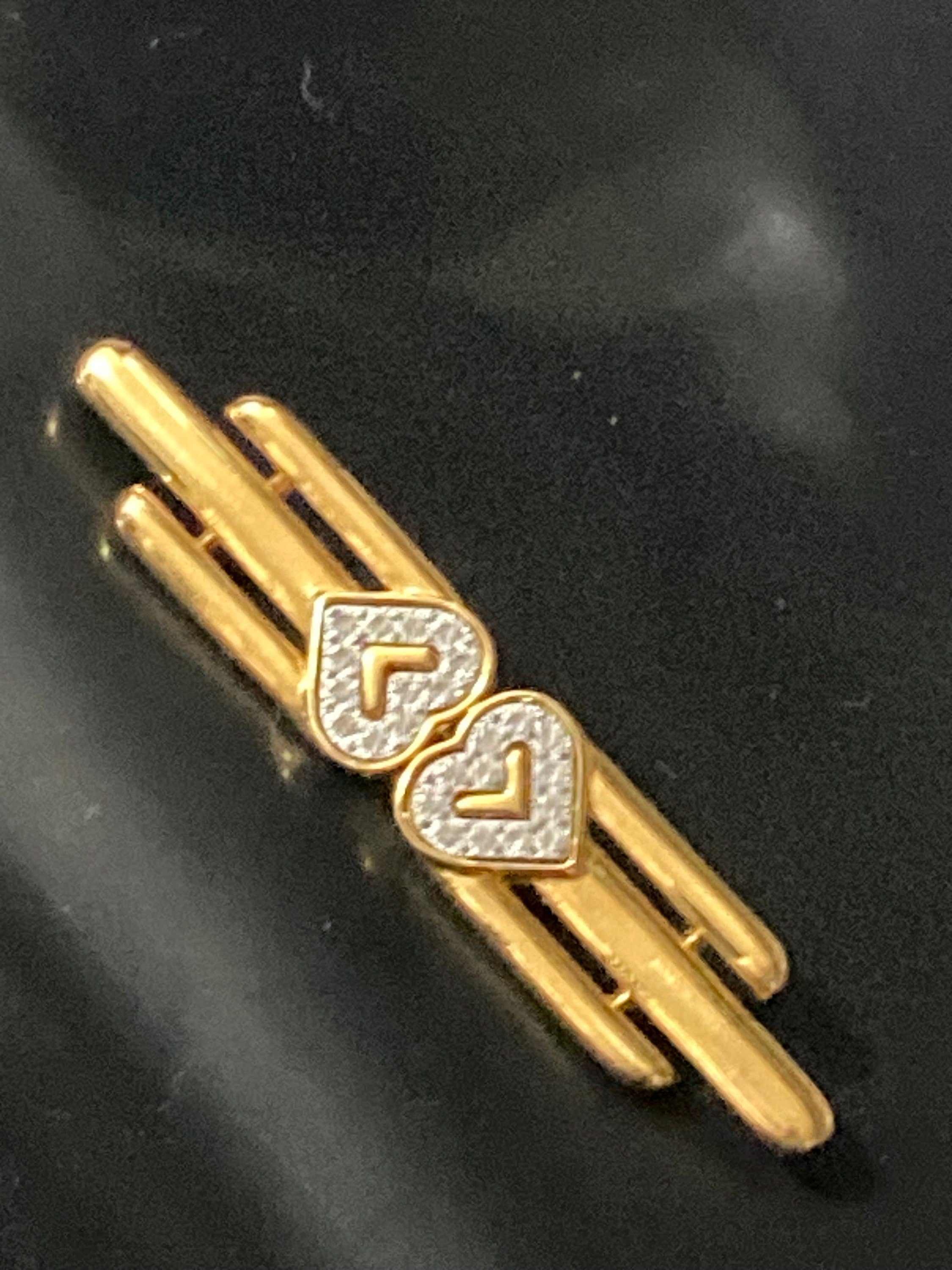 Signed MONET large gold tone diamanté love heart bar brooch