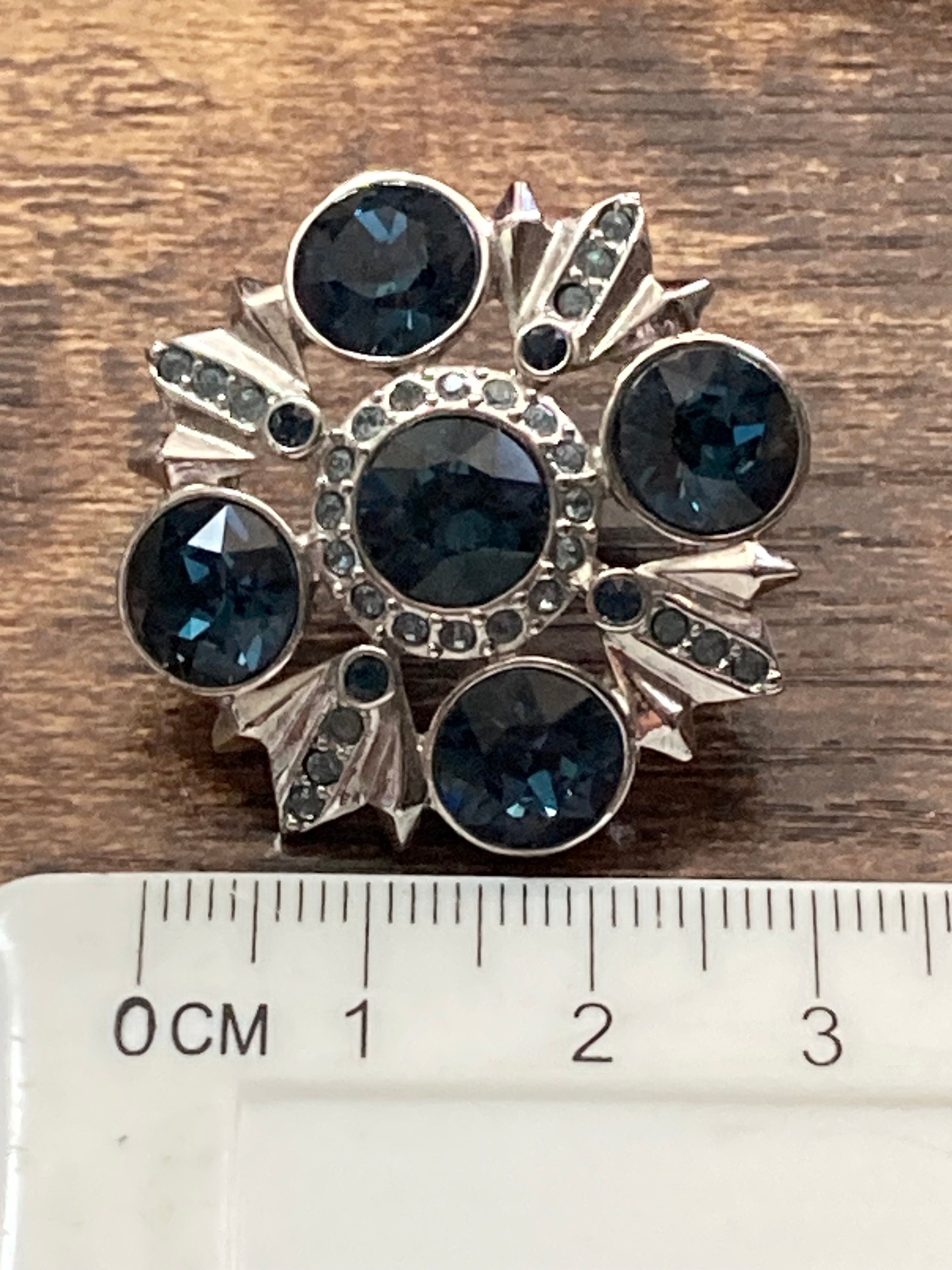 Signed vintage Givenchy clip on earrings silver tone with sapphire blue diamanté