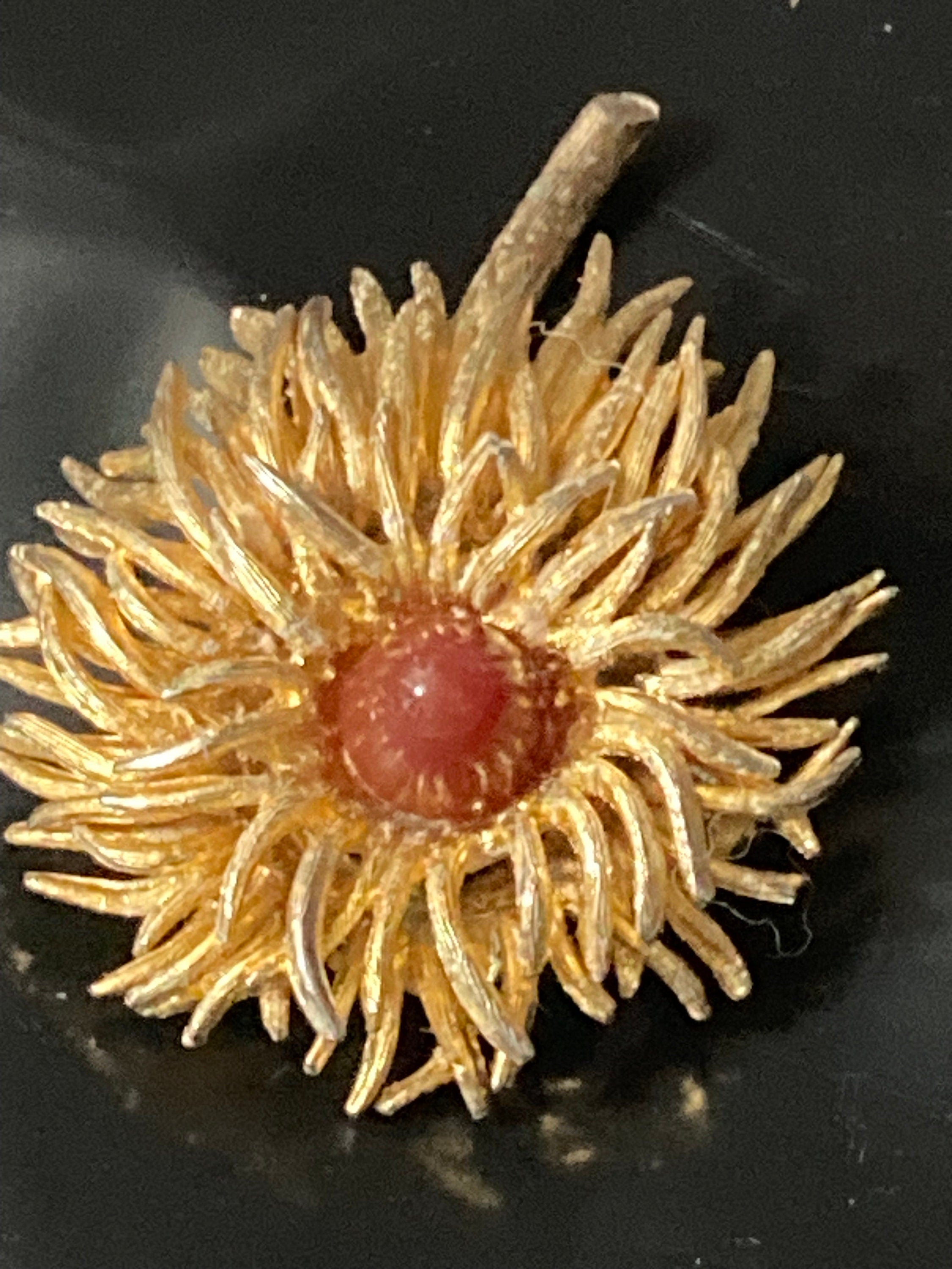 modernist anemone flower brooch with central carnelian glass cabochon