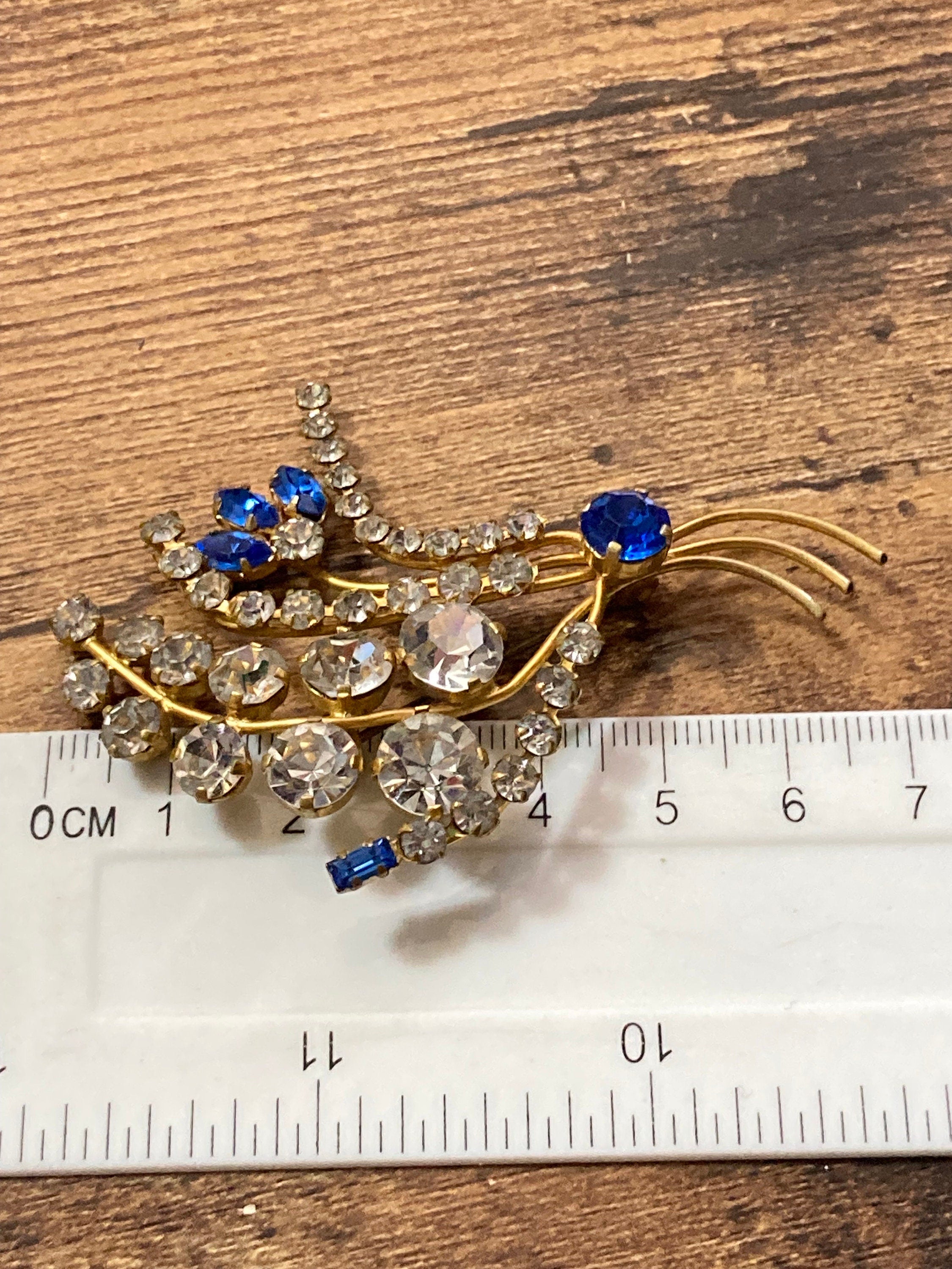 Vintage floral rhinestone paste glass Diamanté gold tone Brooch with sapphire blue stones