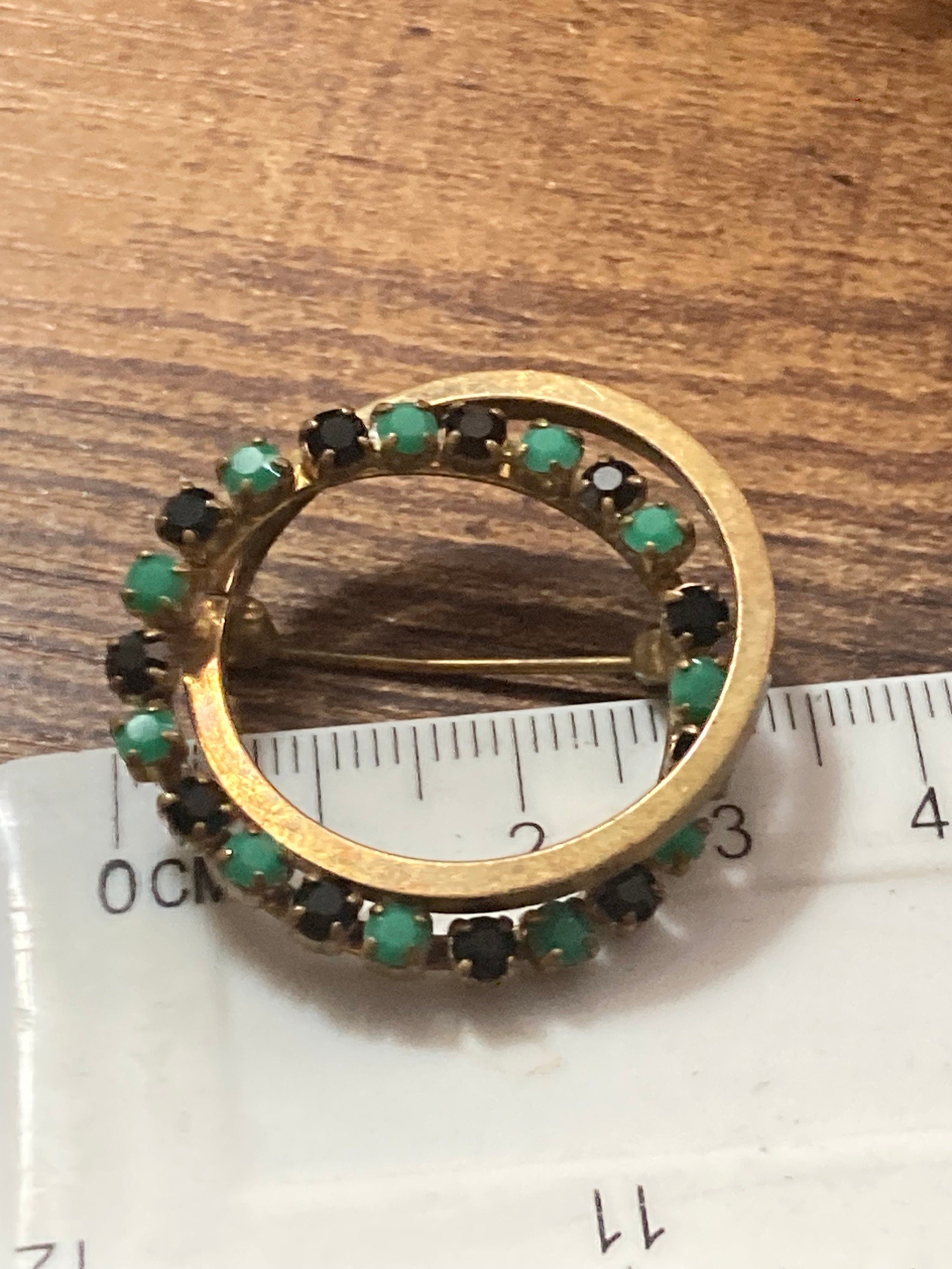 vintage gold tone black and turquoise diamanté abstract  round brooch 1970s