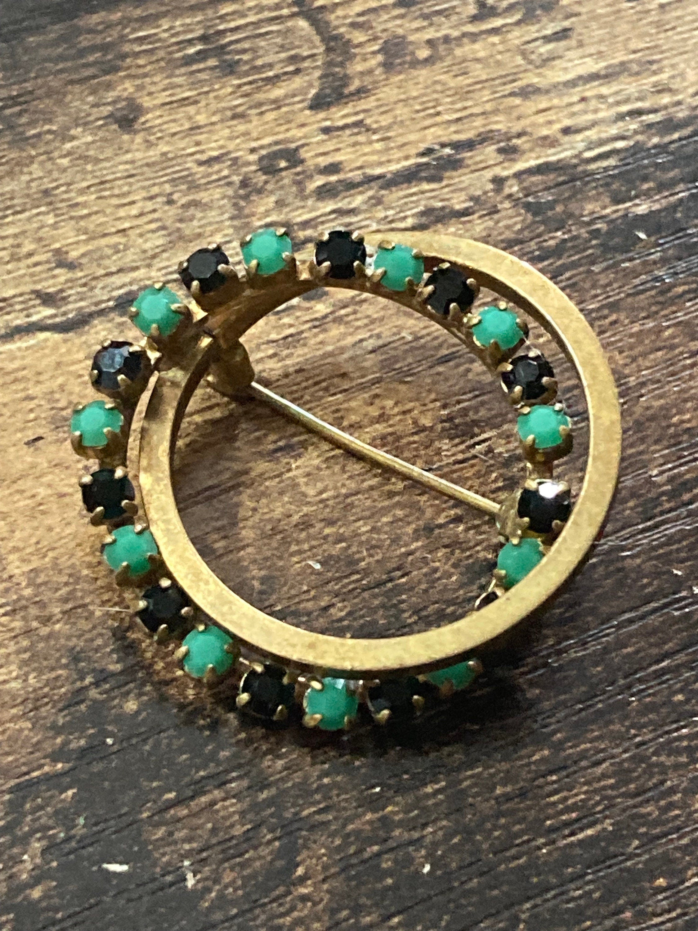 vintage gold tone black and turquoise diamanté abstract  round brooch 1970s
