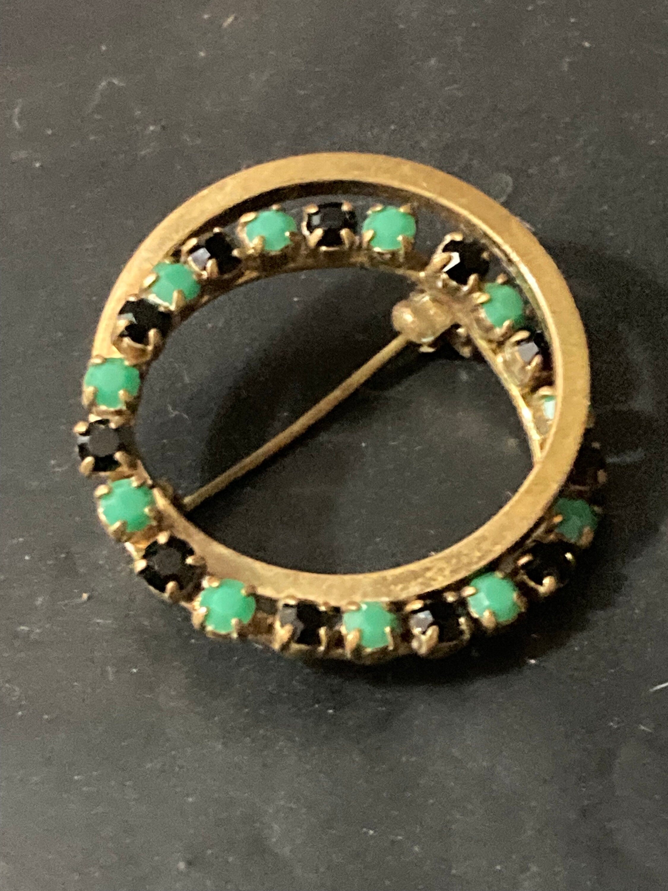 vintage gold tone black and turquoise diamanté abstract  round brooch 1970s