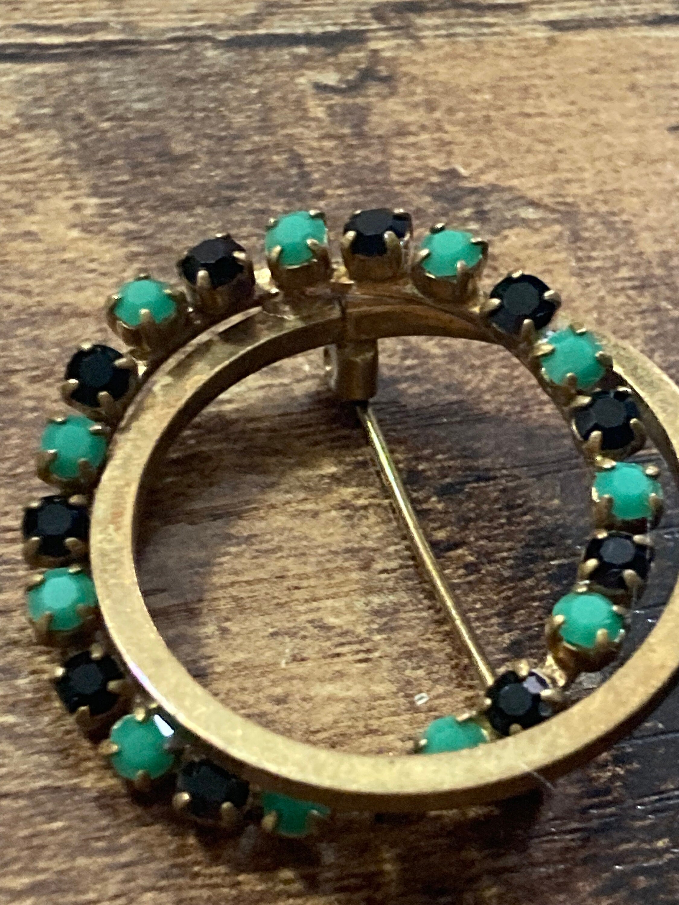 vintage gold tone black and turquoise diamanté abstract  round brooch 1970s