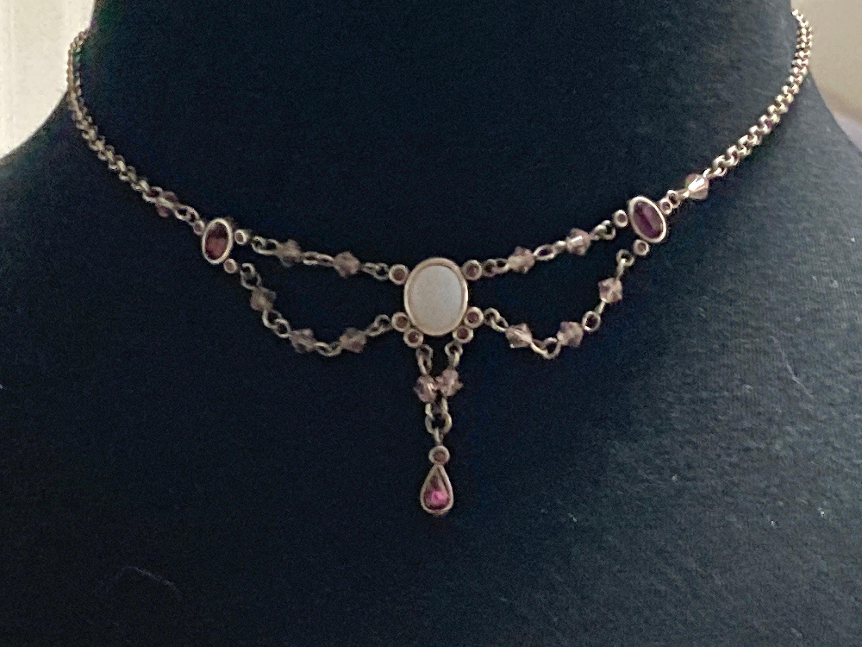 Signed AGATHA PARIS silver tone Latinate drop chain necklace with pink purple diamanté