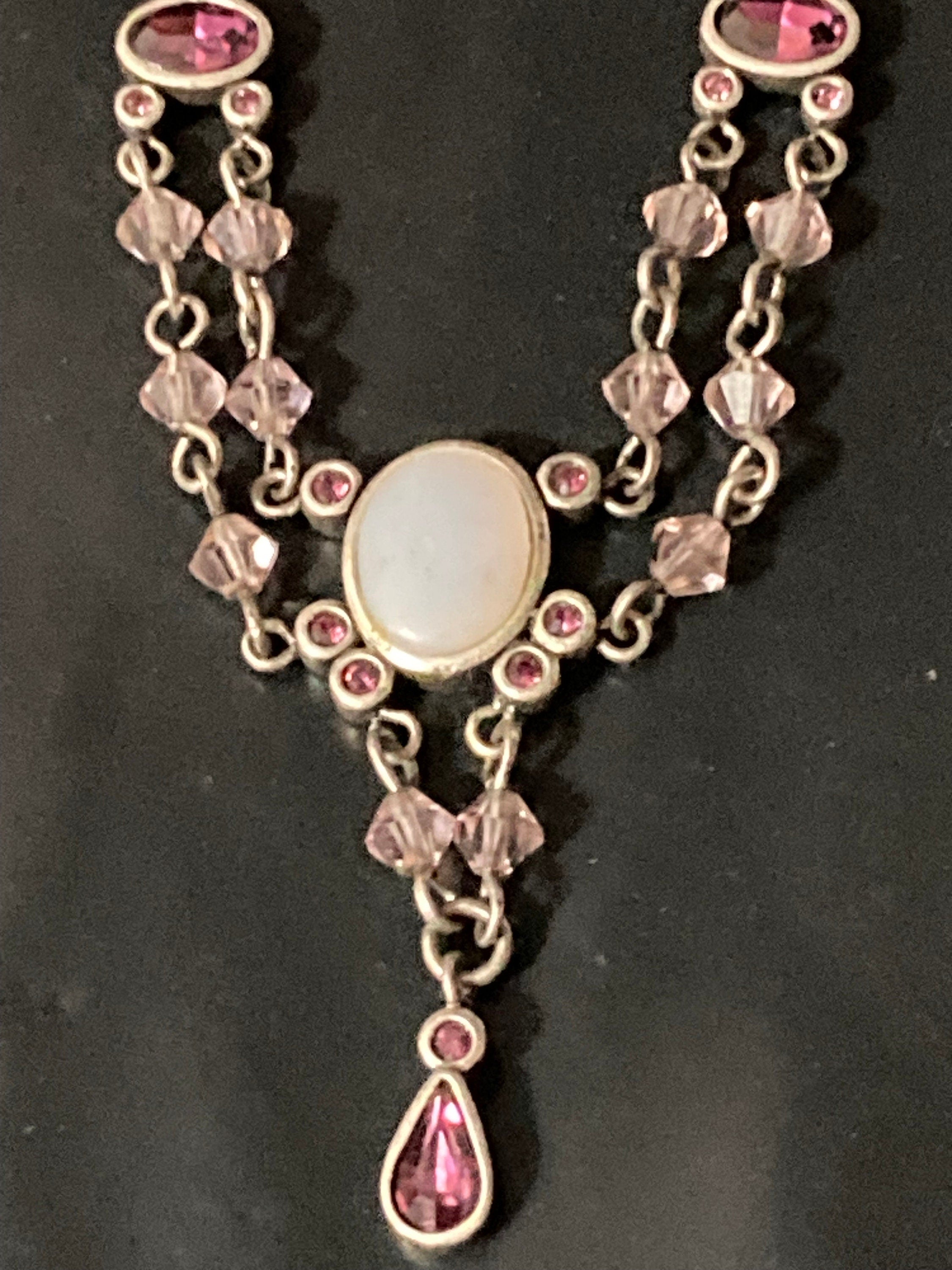 Signed AGATHA PARIS silver tone Latinate drop chain necklace with pink purple diamanté