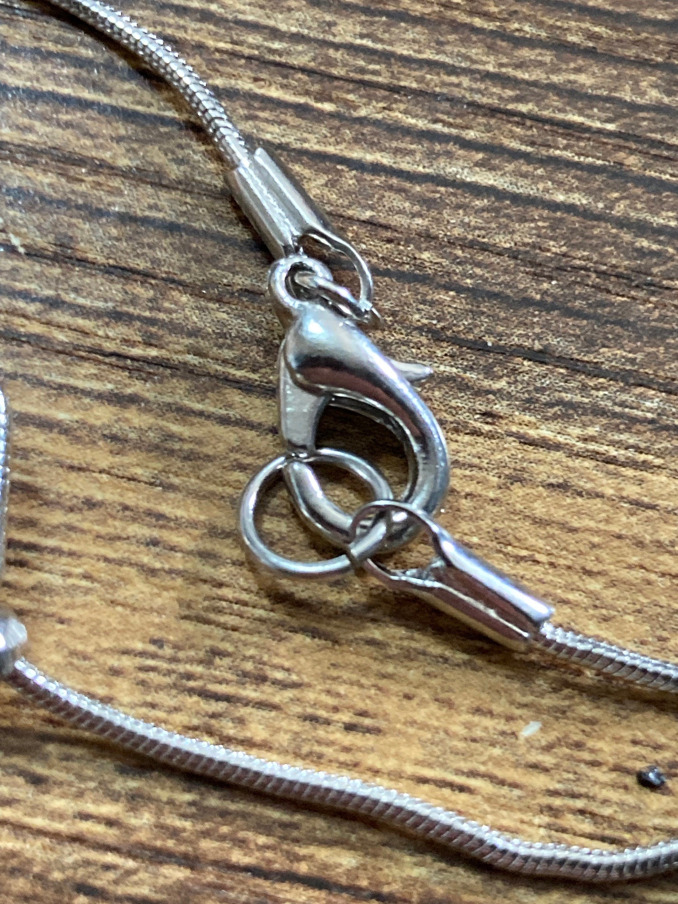 Retro silver tone black cabochon long station necklace snake chain