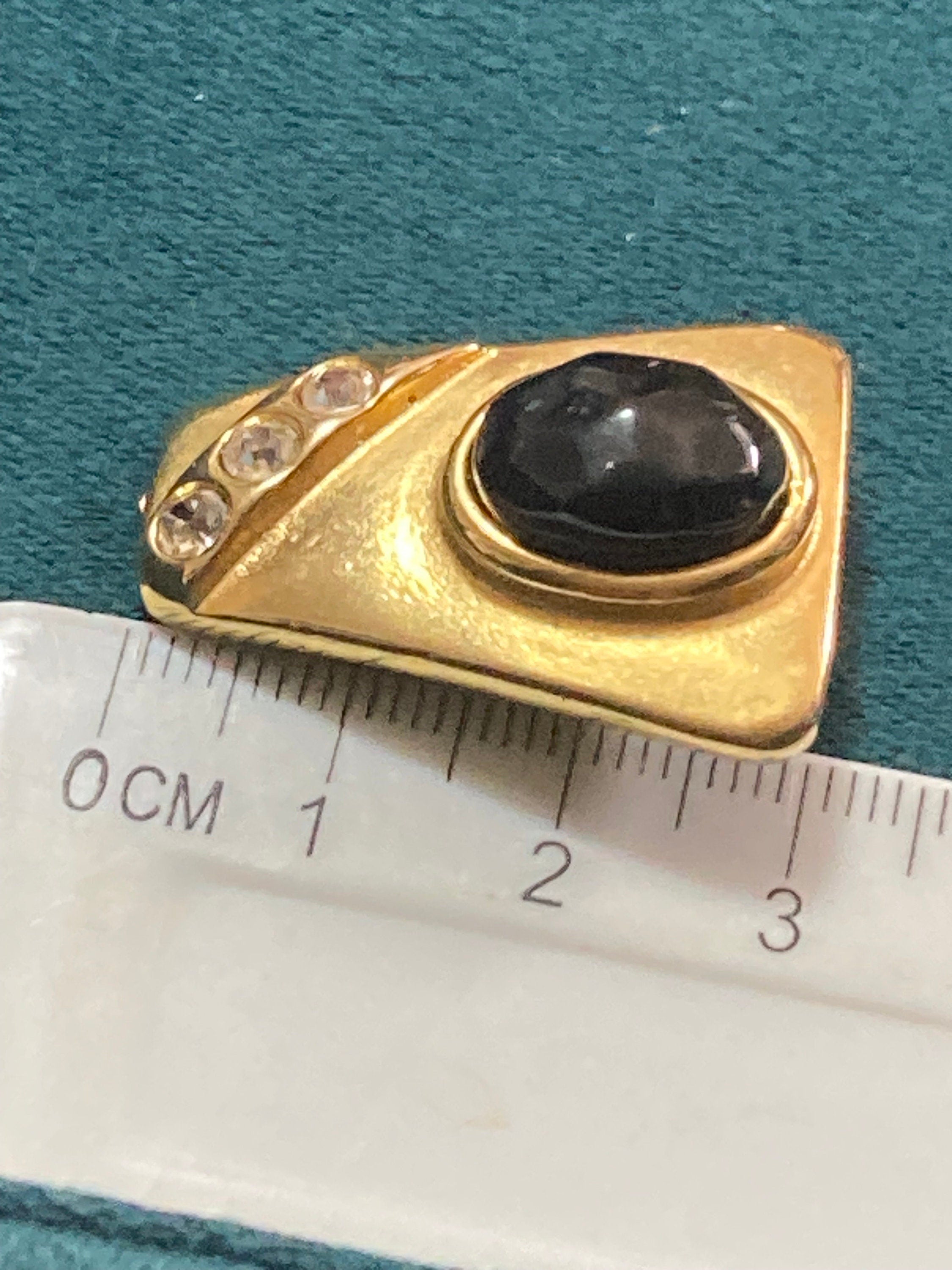 Signed Rita Frascione vintage Gold tone gold black cabochon clip on earrings stud