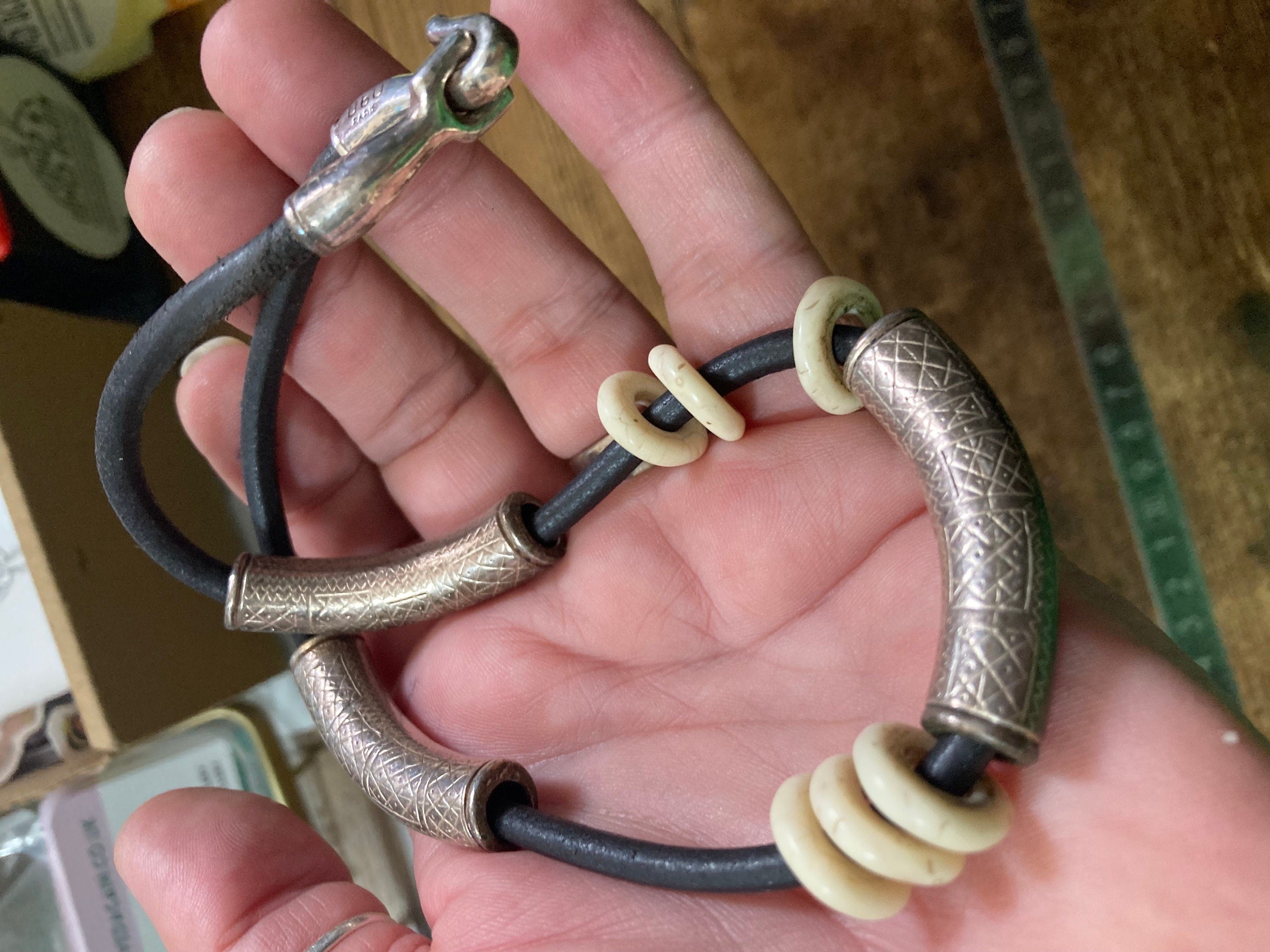 Signed designer UBU PARIS black leather necklace with ornate etched silver tubing  Etruscan style