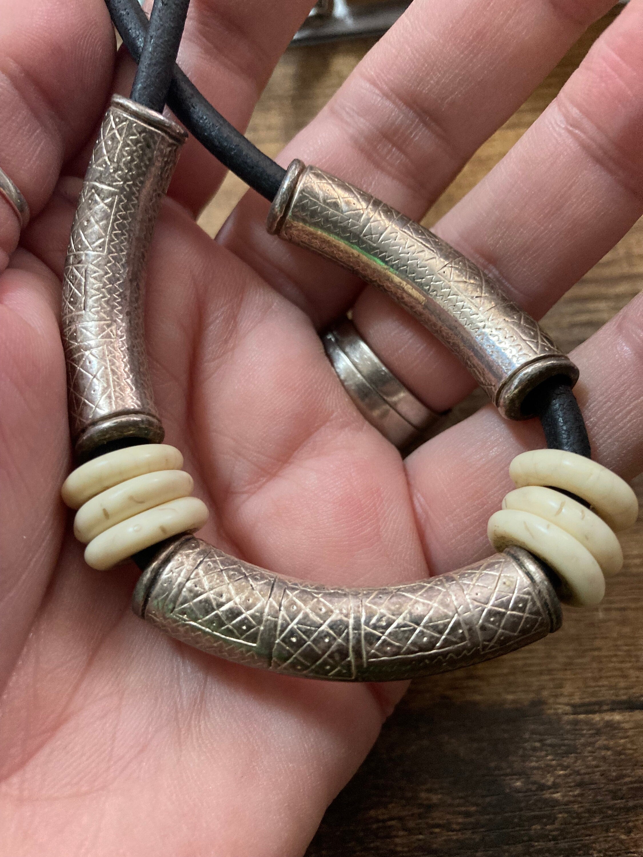 Signed designer UBU PARIS black leather necklace with ornate etched silver tubing  Etruscan style
