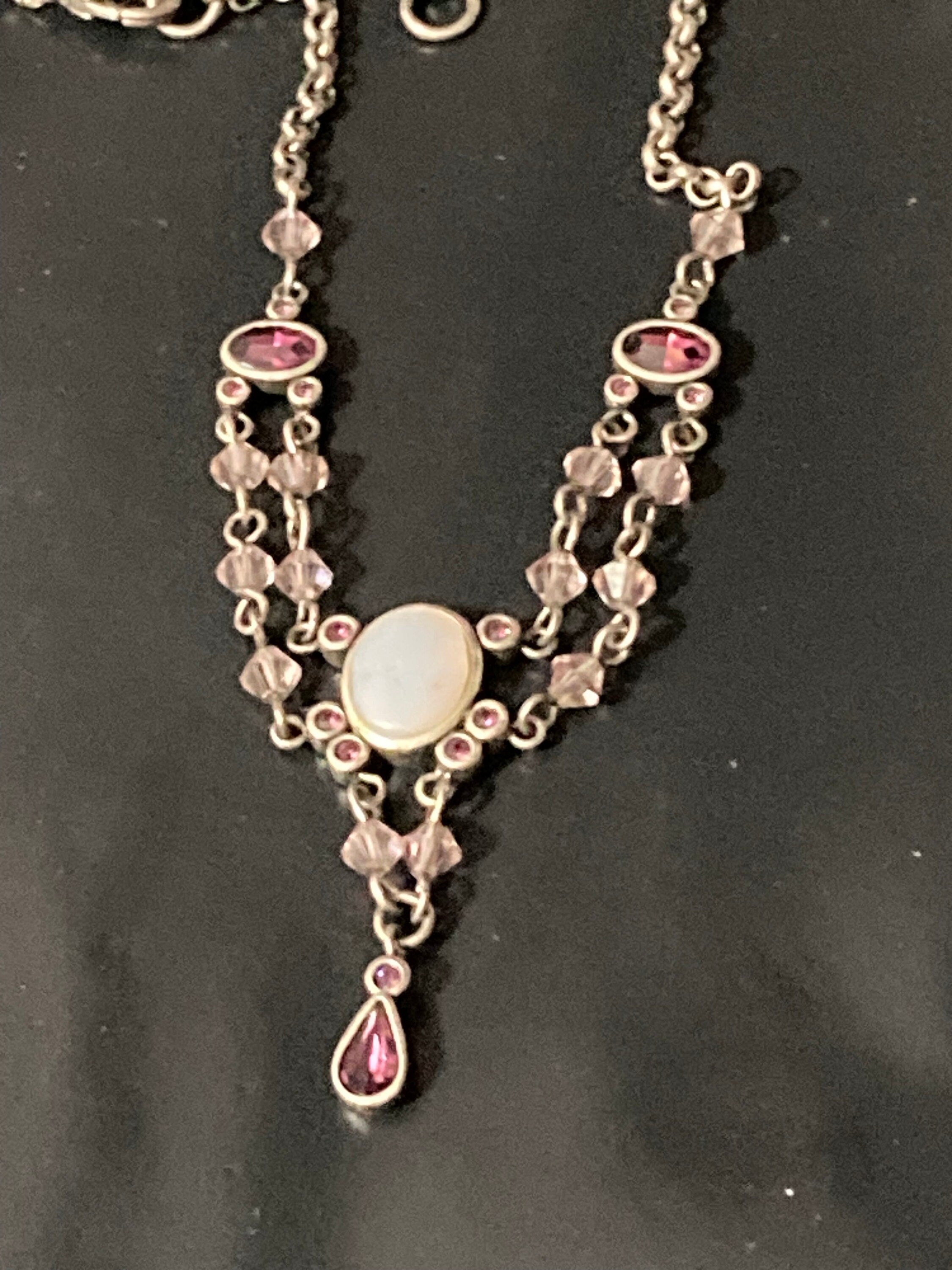 Signed AGATHA PARIS silver tone Latinate drop chain necklace with pink purple diamanté
