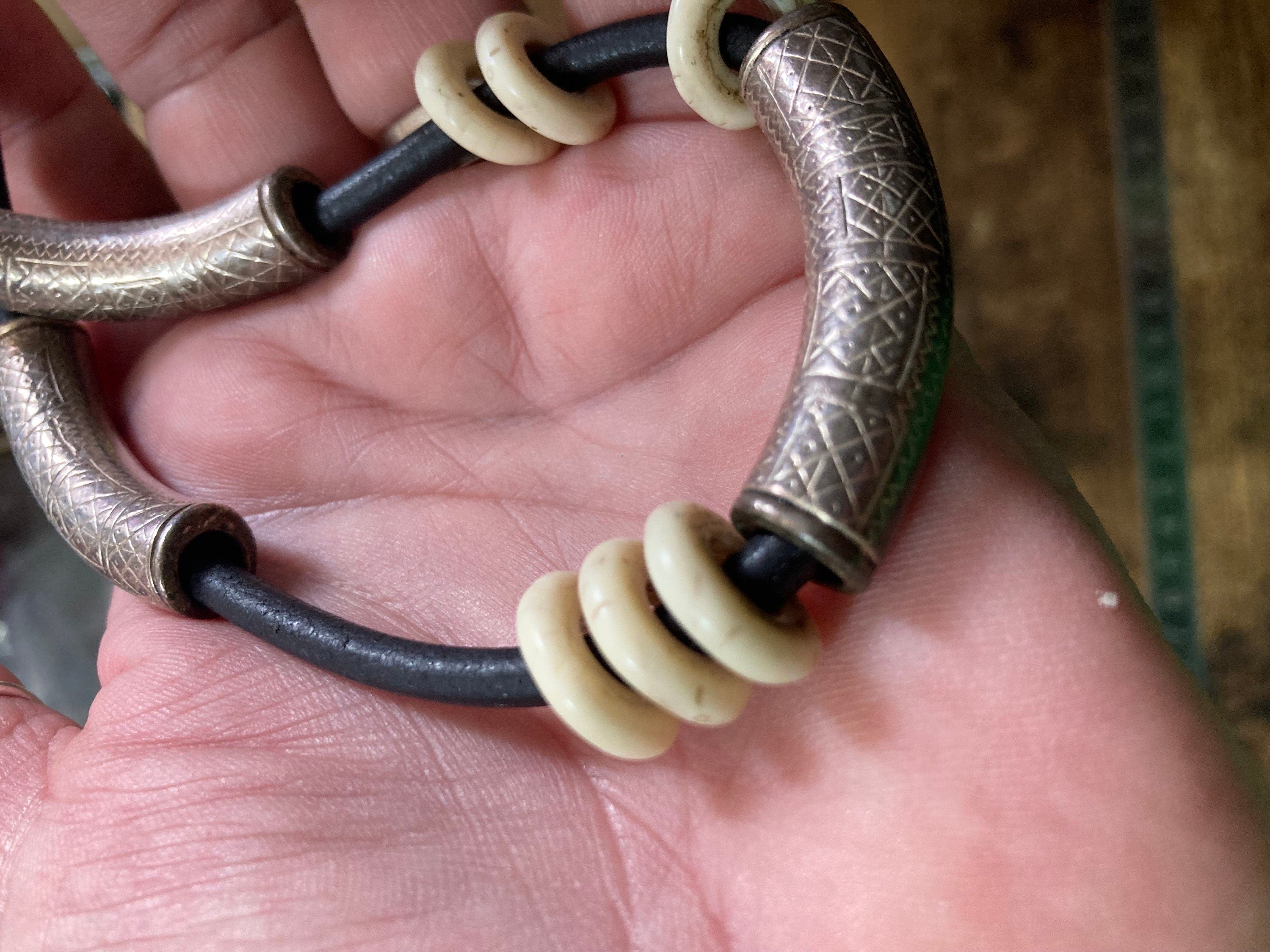 Signed designer UBU PARIS black leather necklace with ornate etched silver tubing  Etruscan style