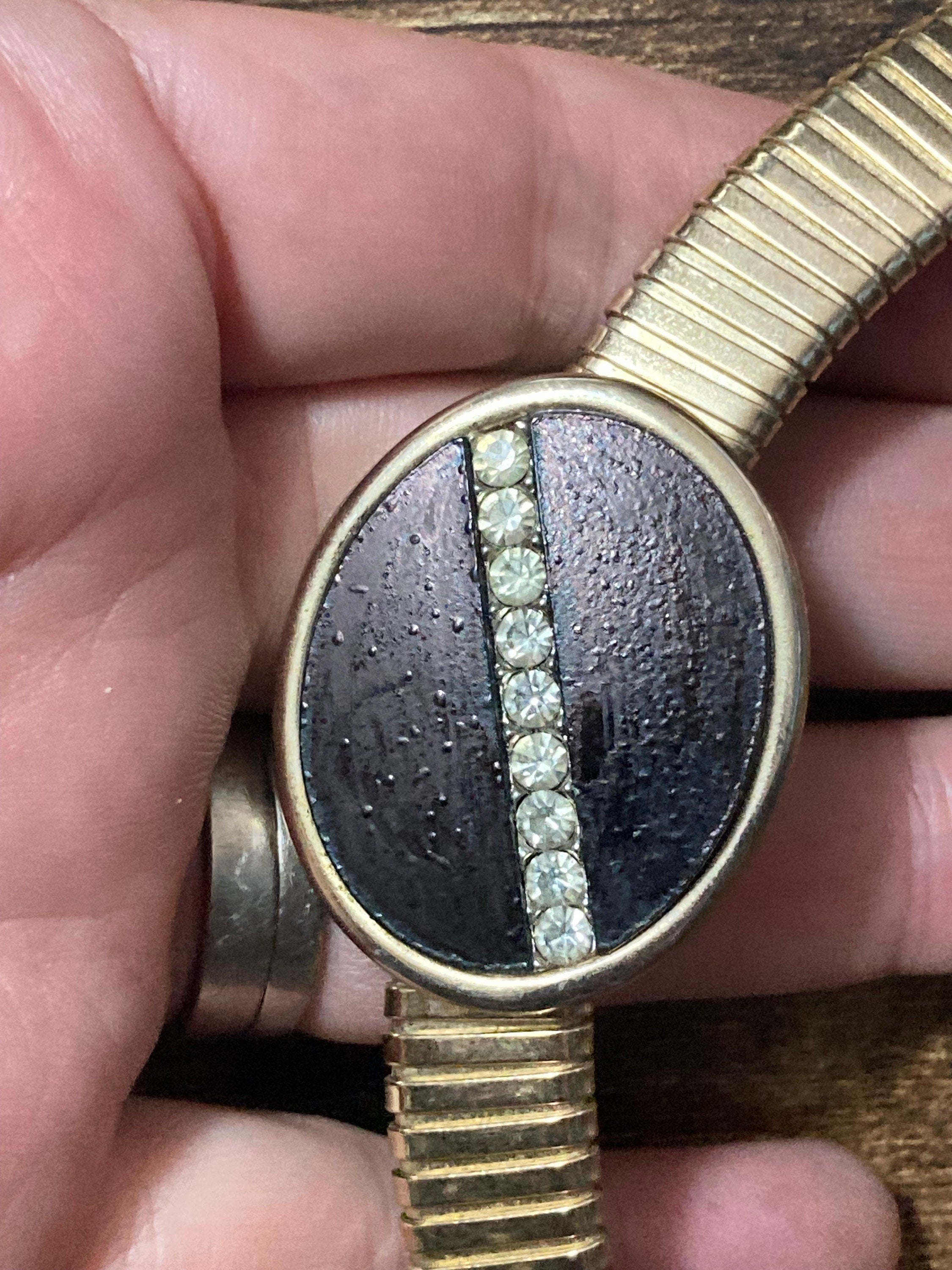 Signed park lane Gold tone omega choker necklace with black Oval diamanté cabochon