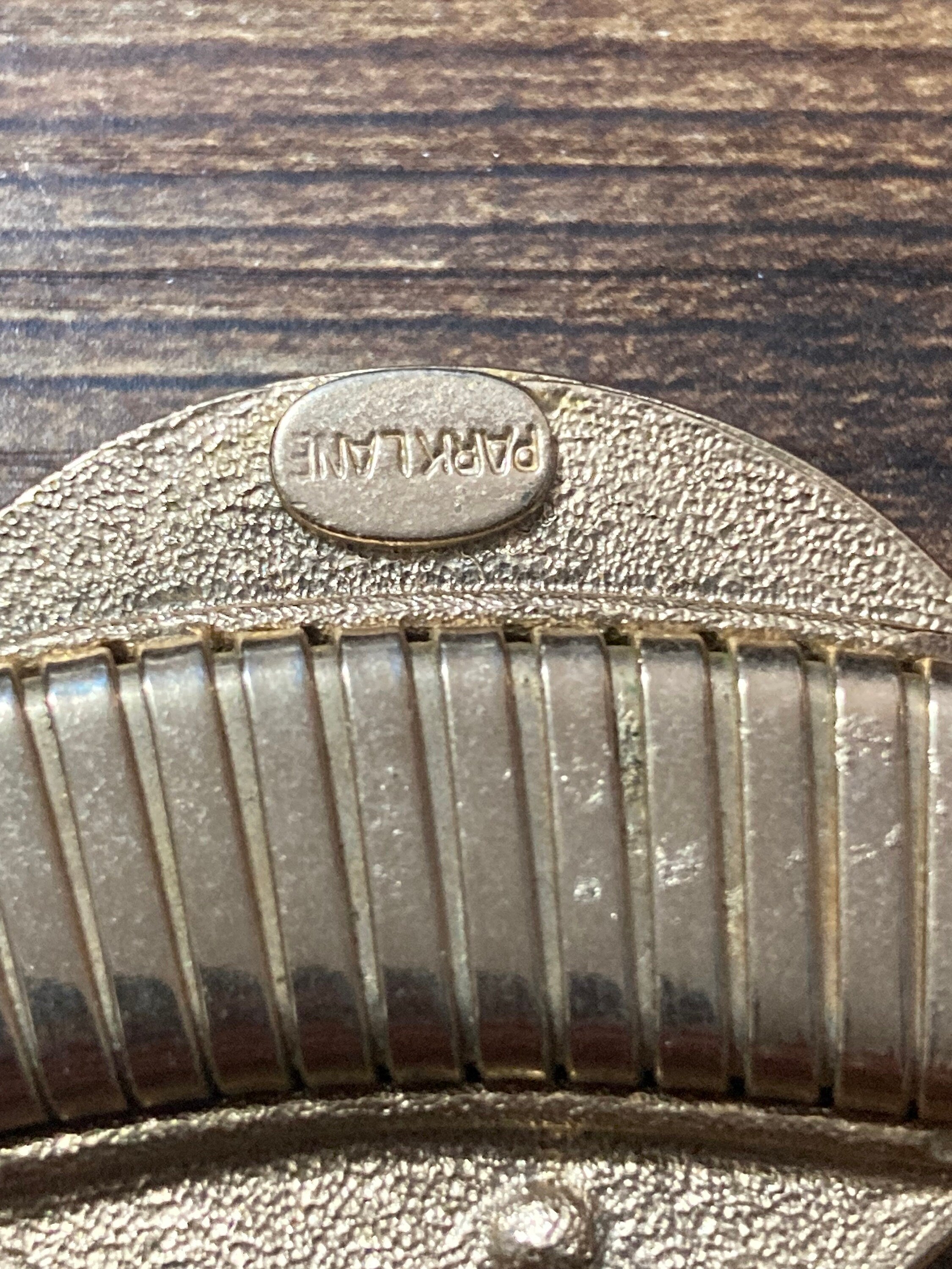 Signed park lane Gold tone omega choker necklace with black Oval diamanté cabochon