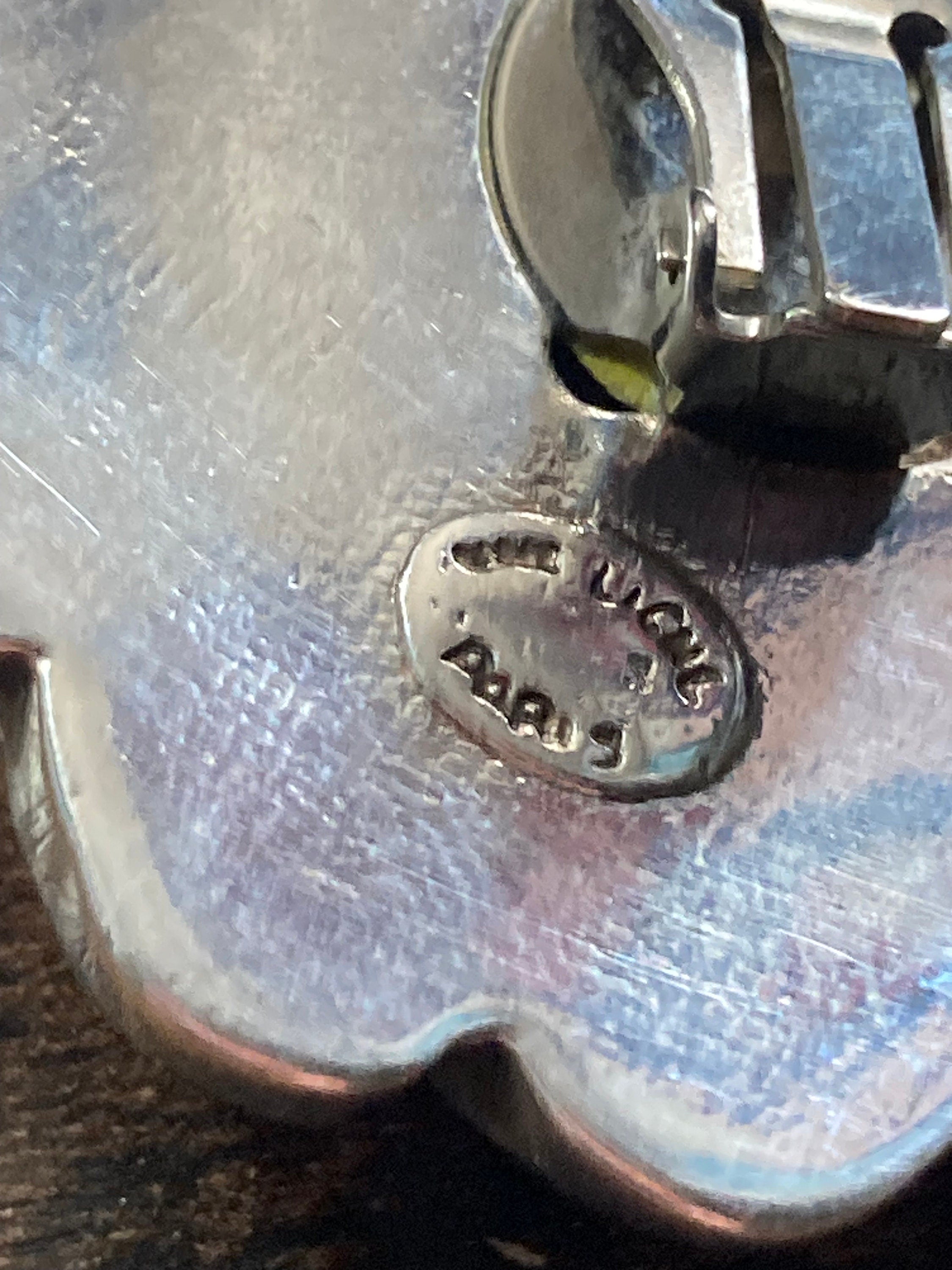 Oversized Signed UNE LIGNE Paris silver tone metal sea shell ammonite clip on stud earrings