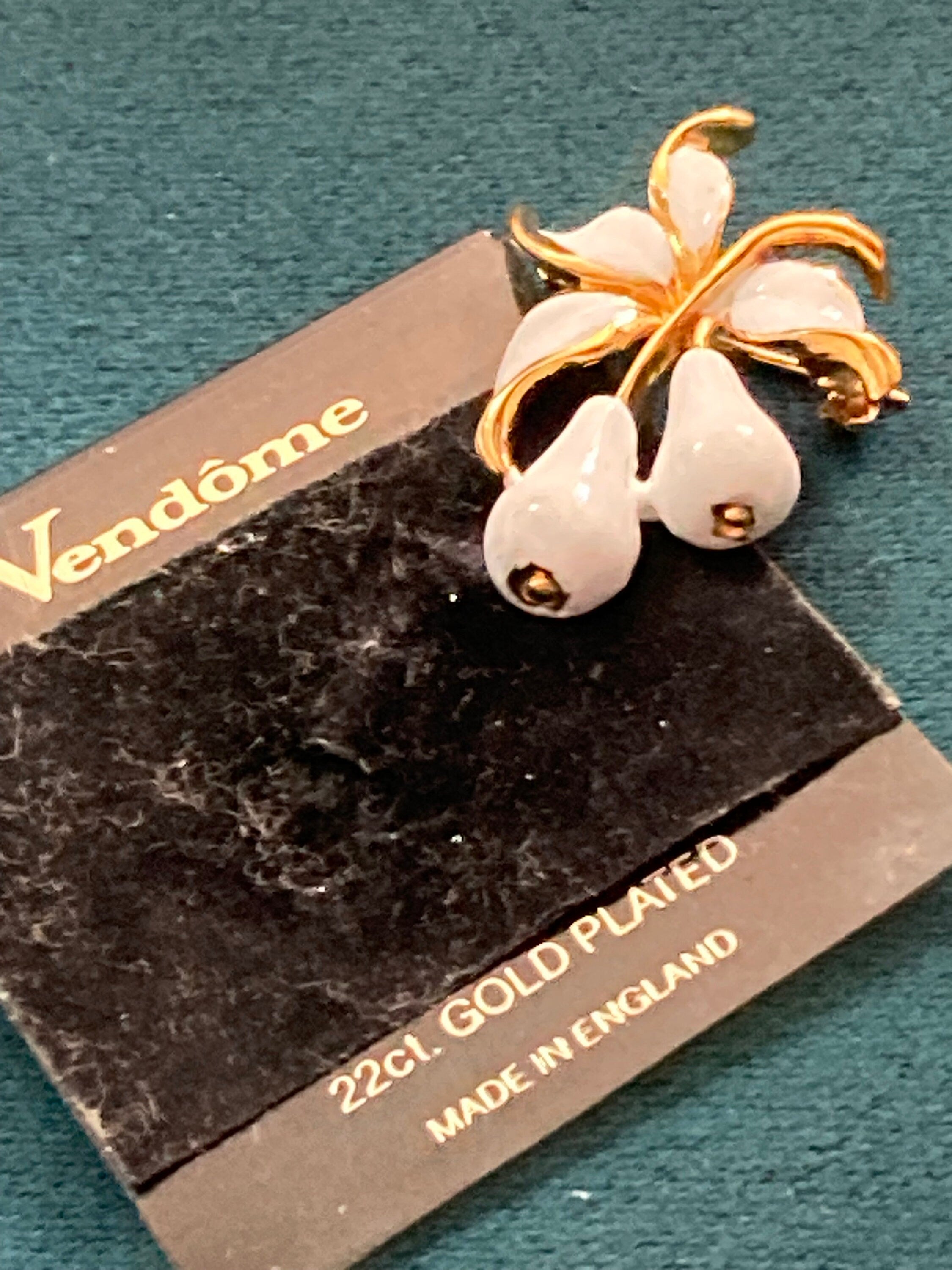 Small 22k gold plated VENDOME white pear fruit brooch on original card