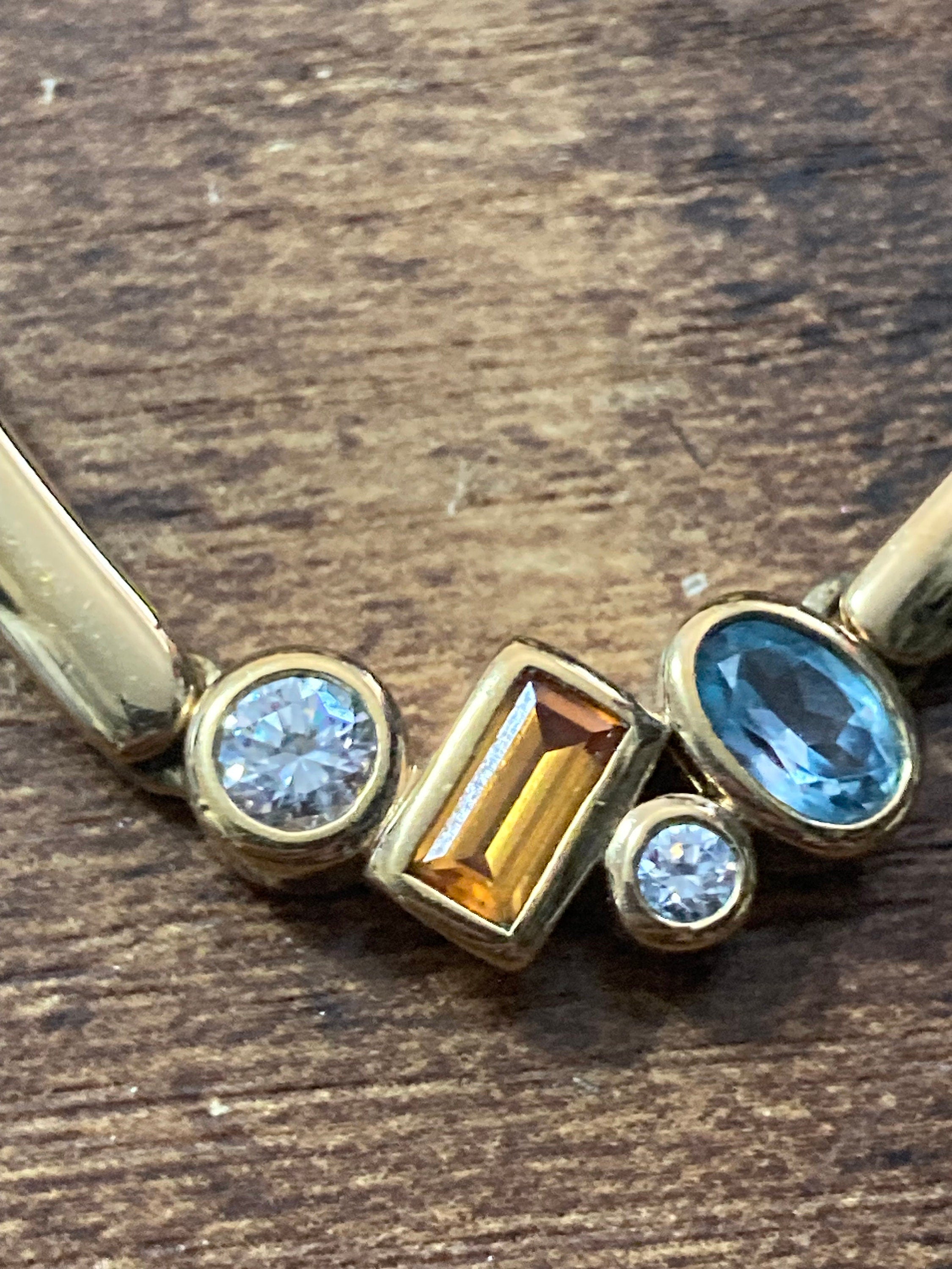 Vintage gold tone curb chain necklace with clear and orange blue glass paste diamanté