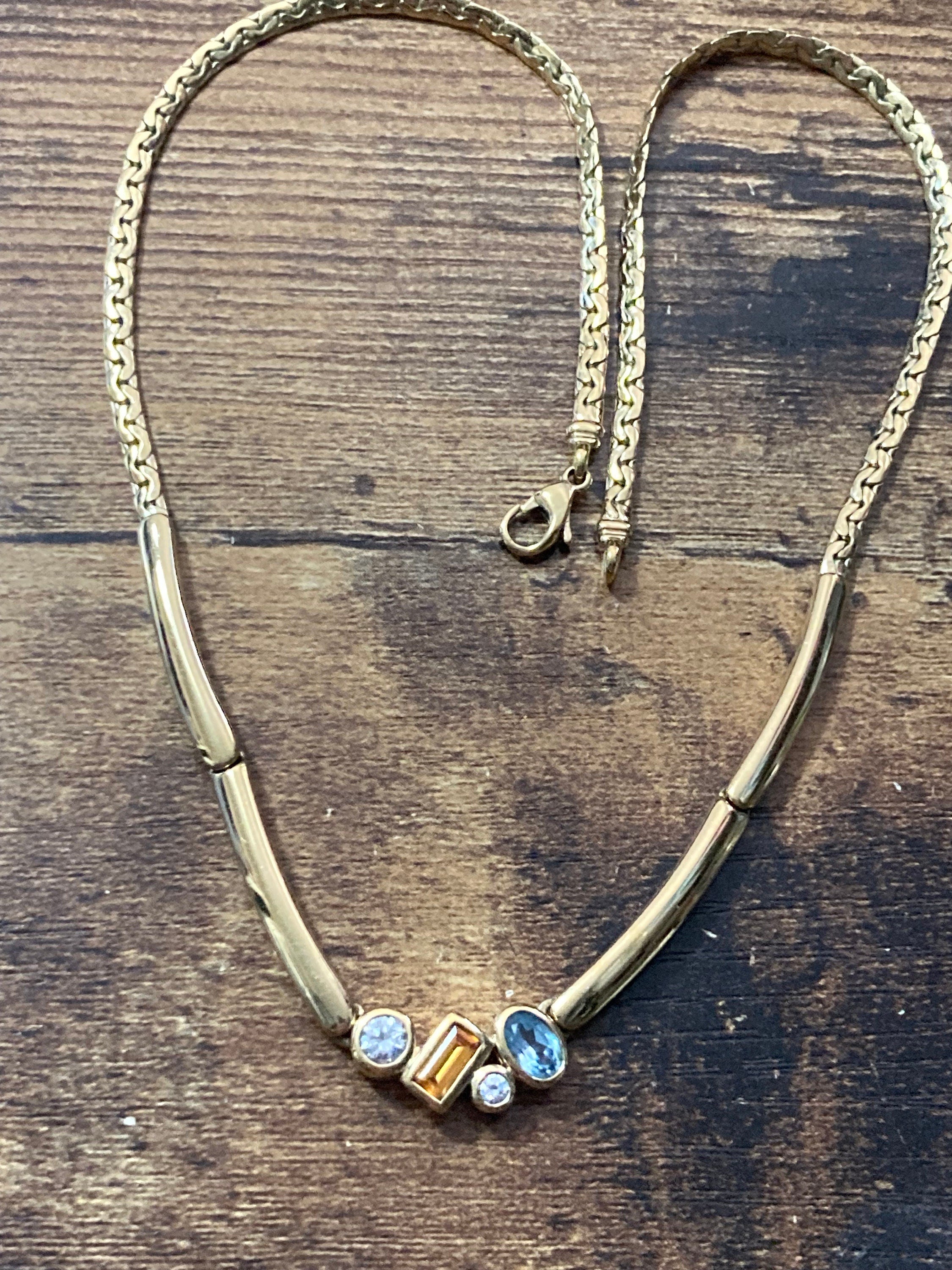 Vintage gold tone curb chain necklace with clear and orange blue glass paste diamanté