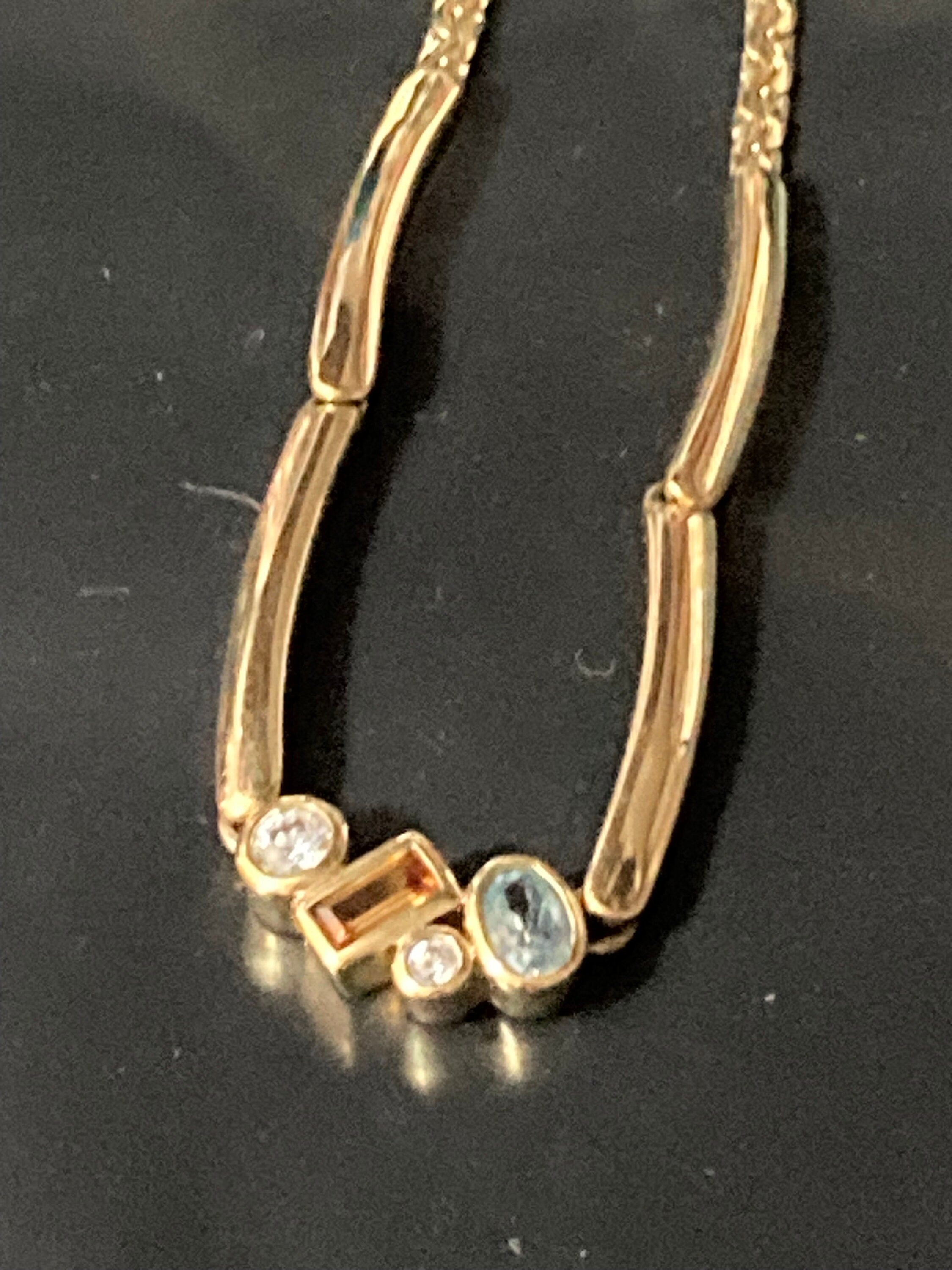 Vintage gold tone curb chain necklace with clear and orange blue glass paste diamanté