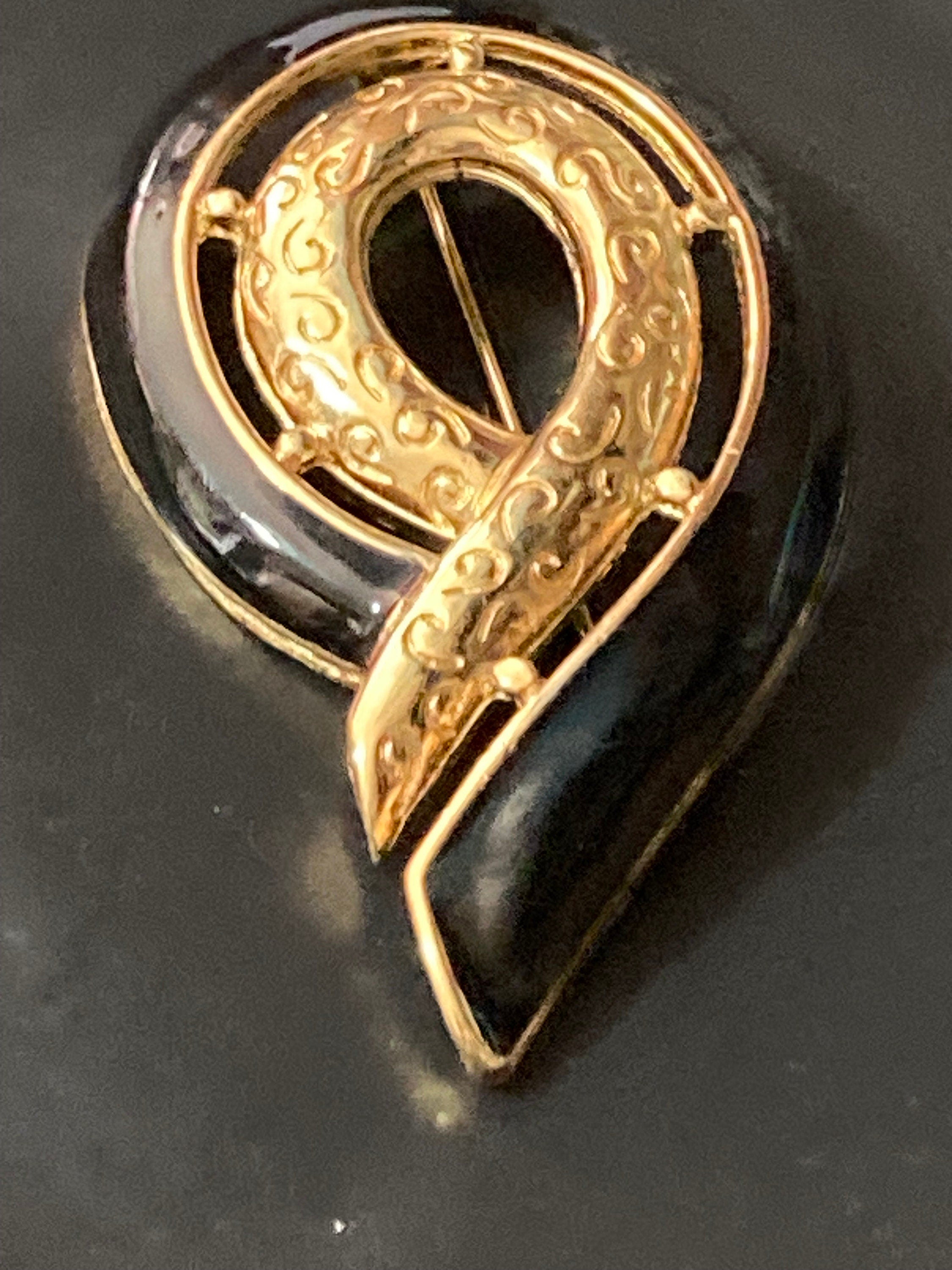 vintage modernist gold tone brooch swirl abstract black enamel