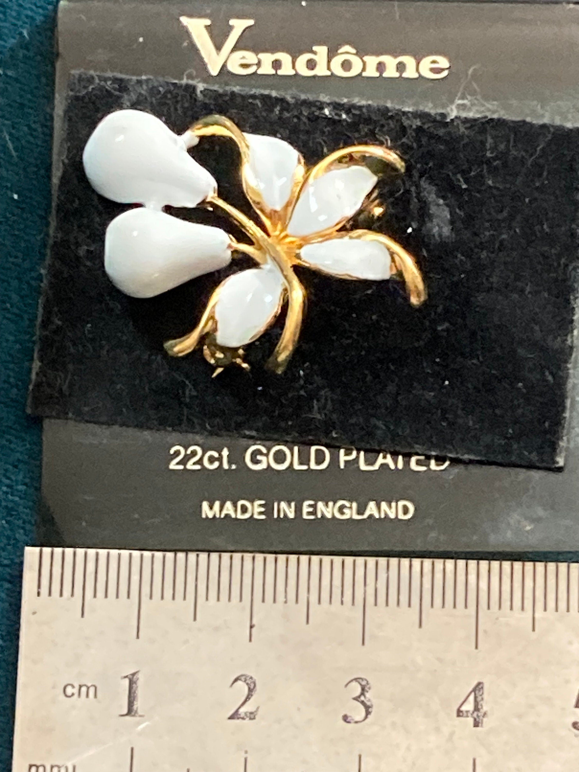 Small 22k gold plated VENDOME white pear fruit brooch on original card