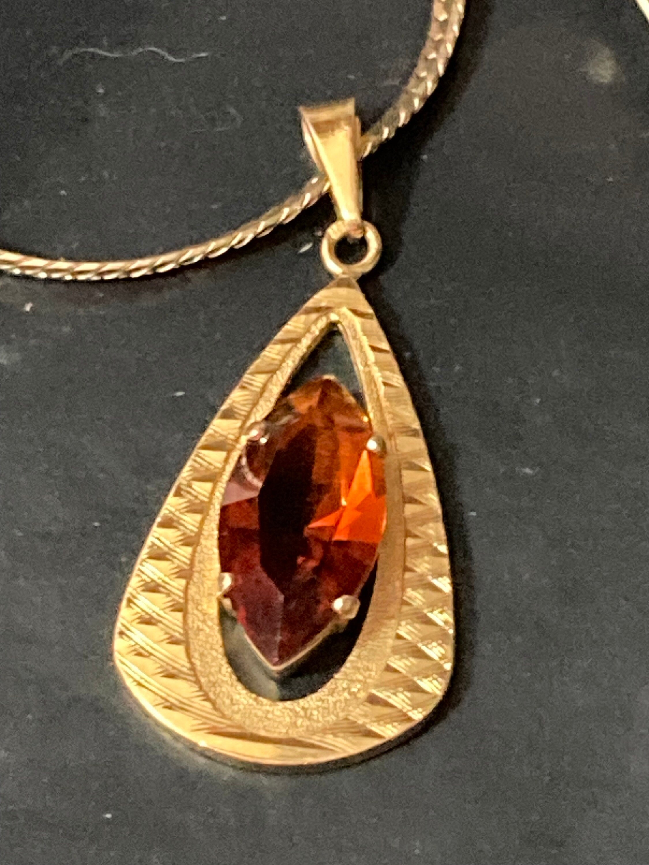 orange faux amber faceted Glass pendant on 40cm gold plated chain Vintage