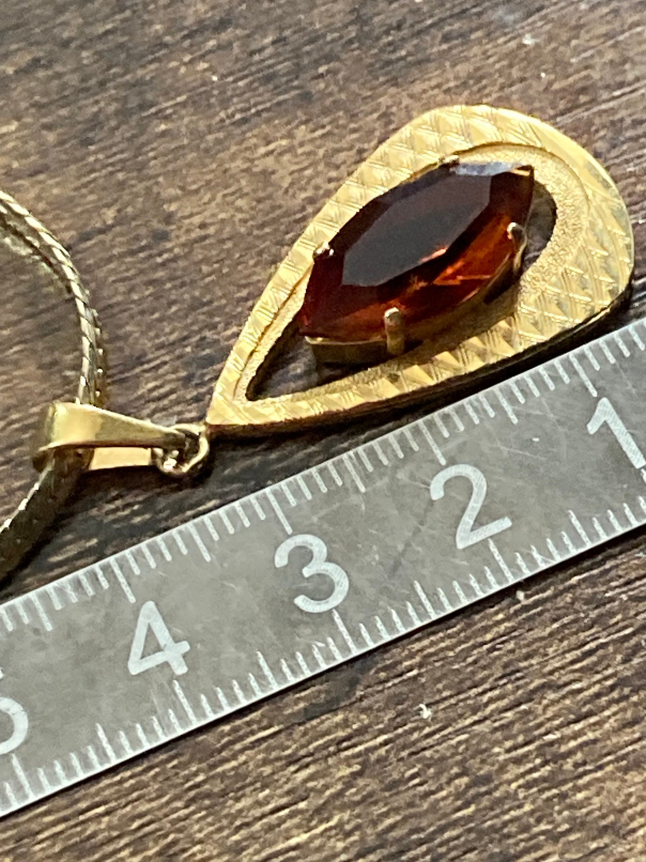 orange faux amber faceted Glass pendant on 40cm gold plated chain Vintage