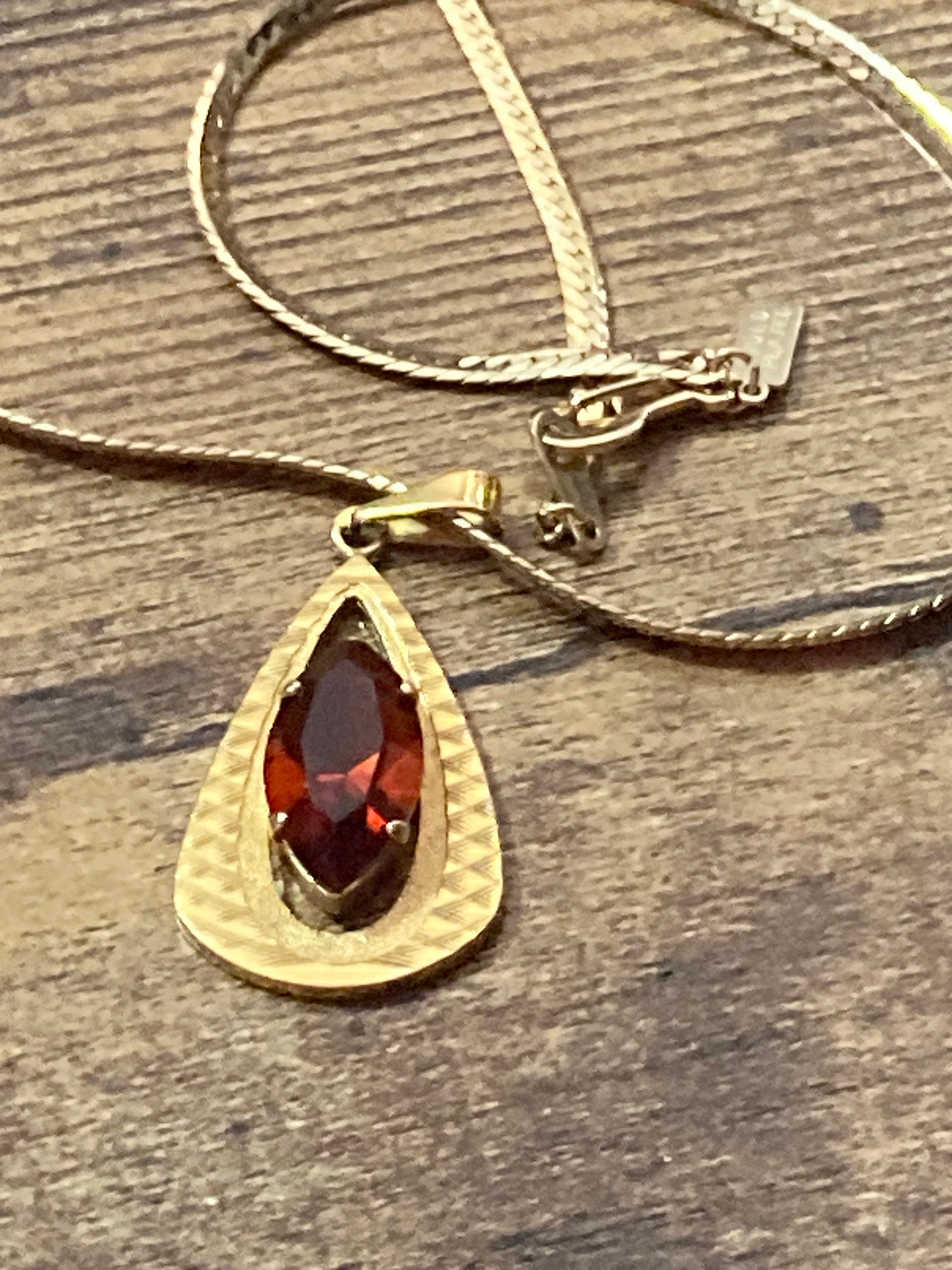 orange faux amber faceted Glass pendant on 40cm gold plated chain Vintage