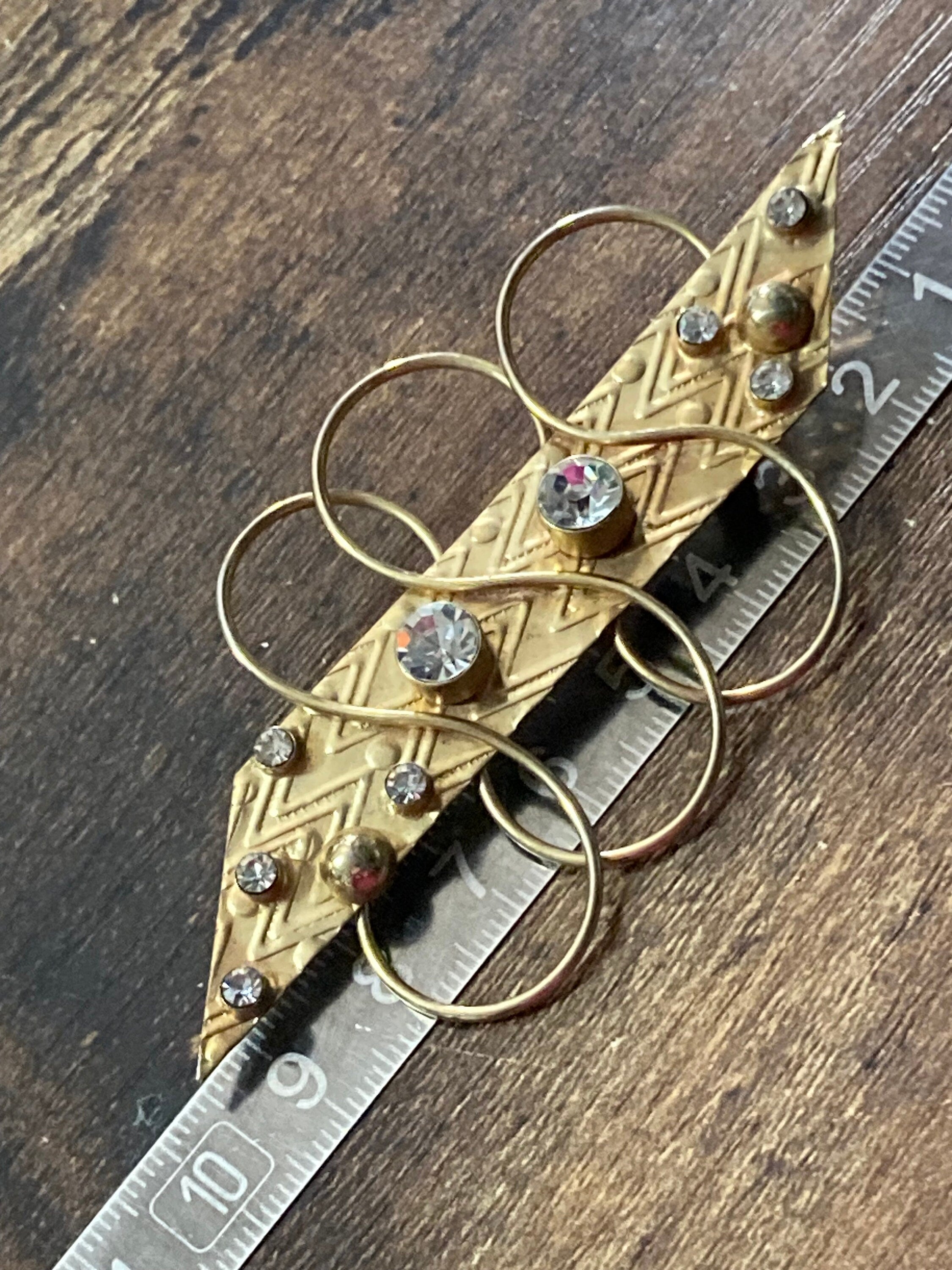 10cm oversized gold tone modernist bar brooch with clear diamanté stones