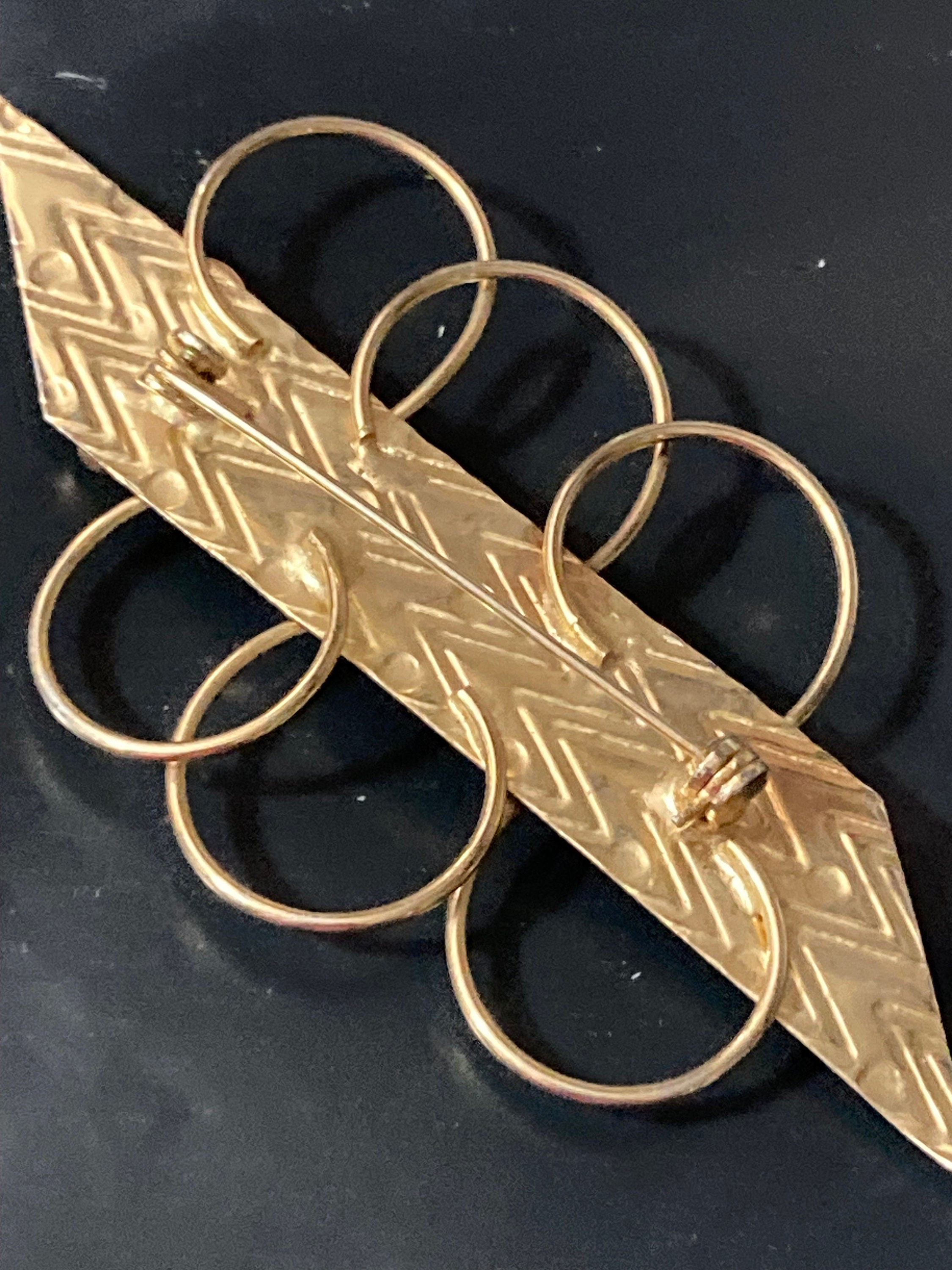 10cm oversized gold tone modernist bar brooch with clear diamanté stones