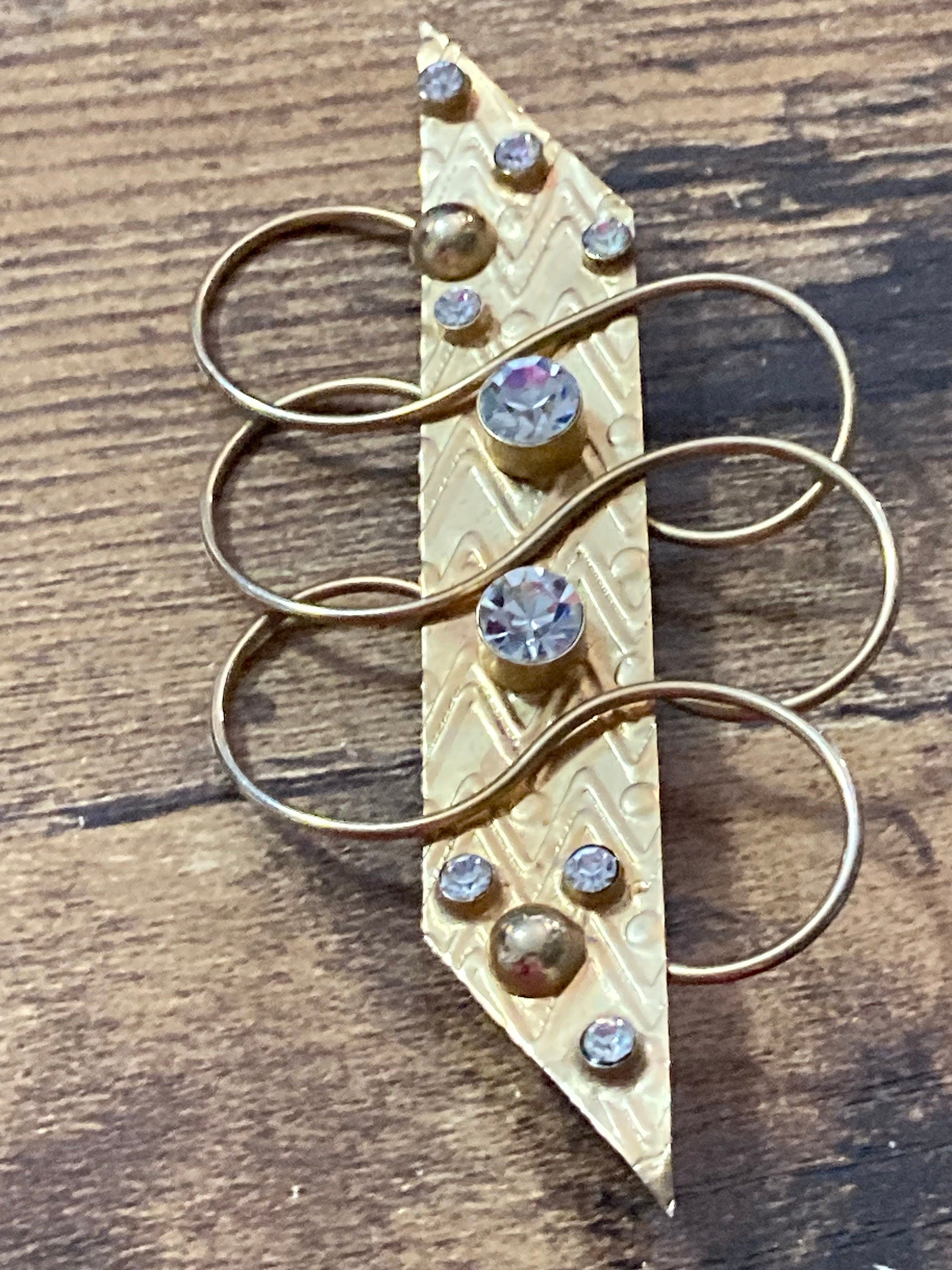 10cm oversized gold tone modernist bar brooch with clear diamanté stones