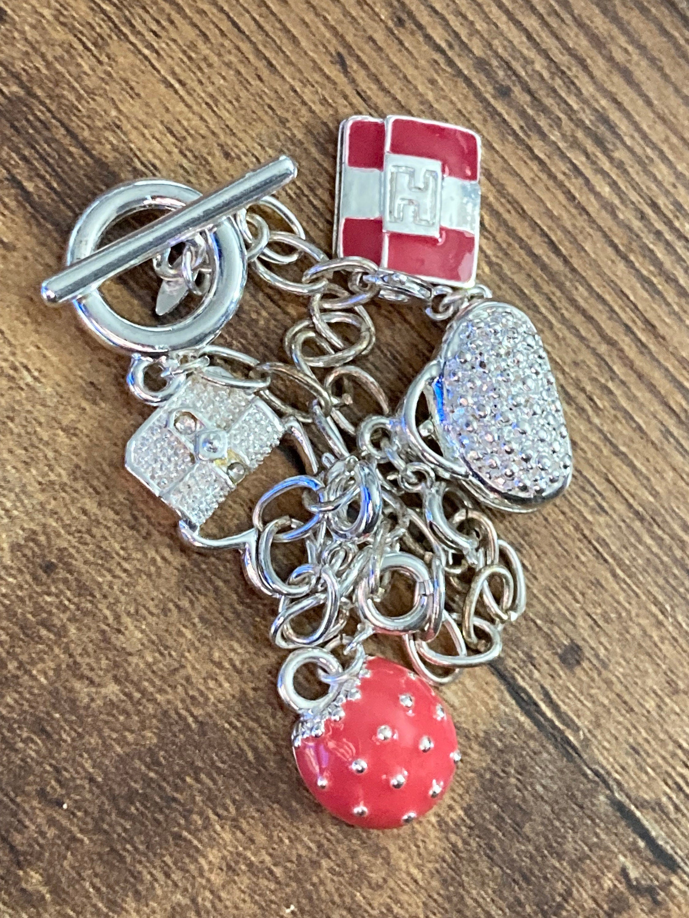 Signed Avon silver tone novelty enamelled handbag purses charm bracelet 19cm