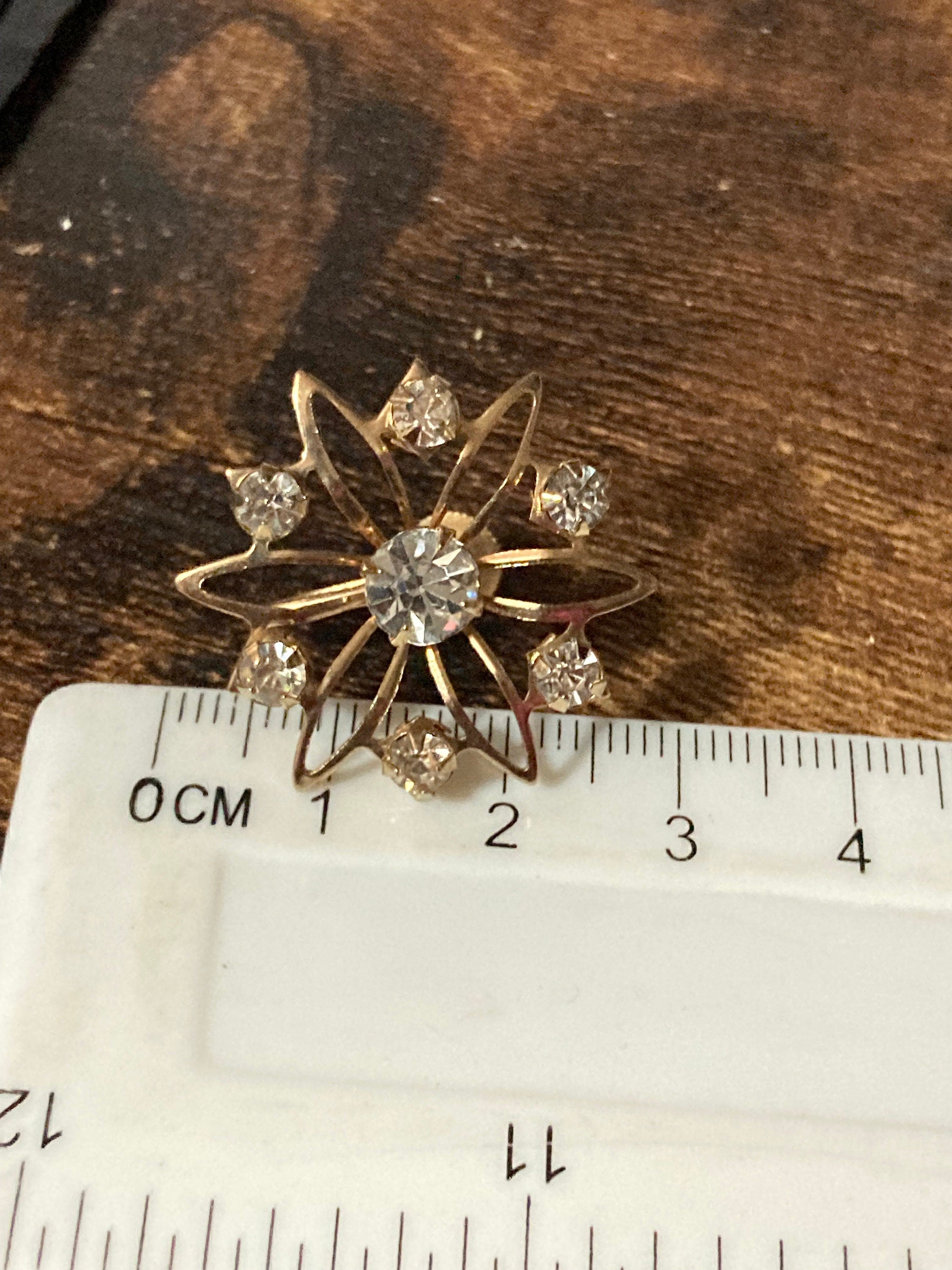 Vintage gold tone clear diamanté atomic Sputnik floral clip on earrings mid century