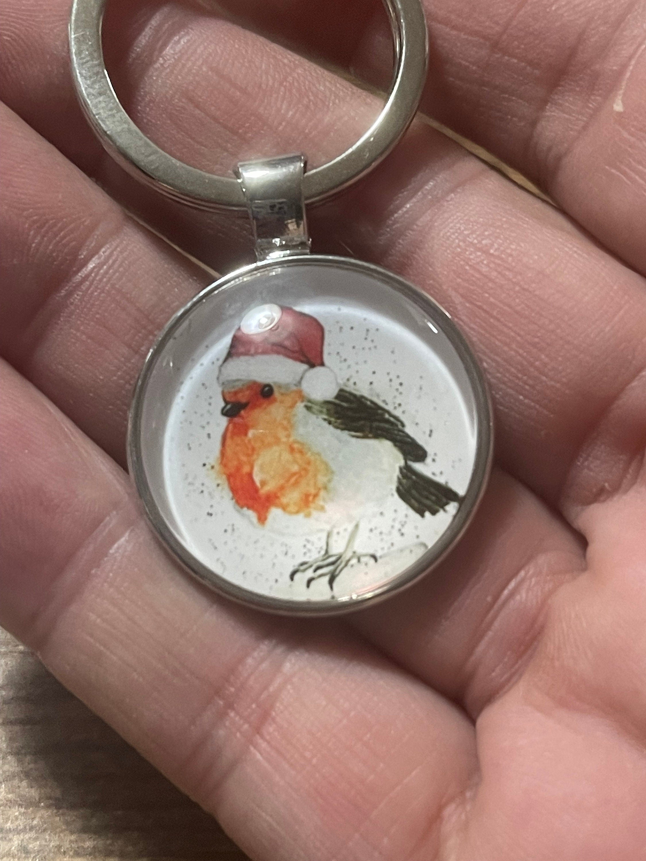 Handmade festive Christmas robin garden bird silver tone keyring with 25mm glass cabochon