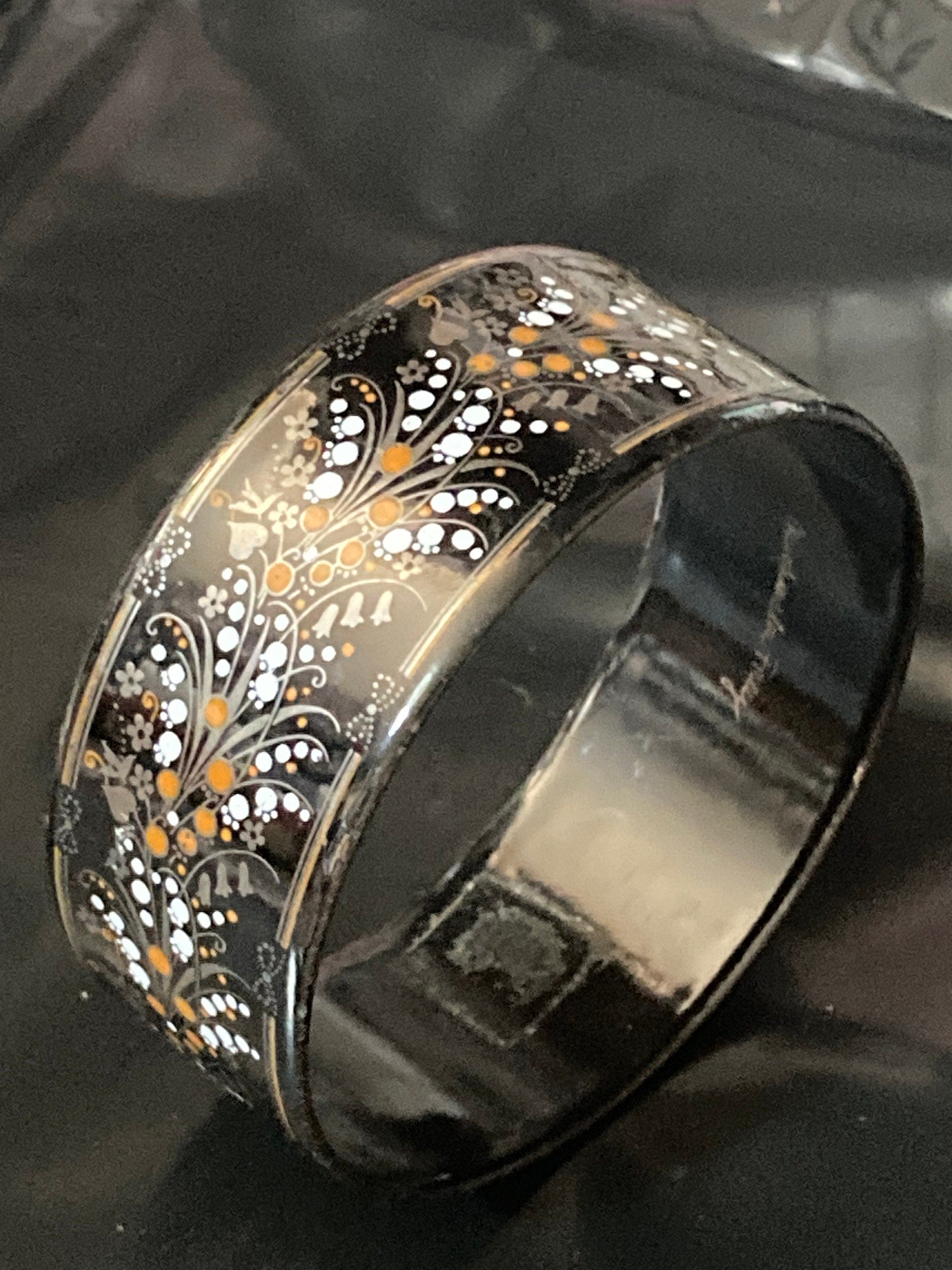 Vintage Michaela Frey black enamel floral bangle lily if the valley design from Austria