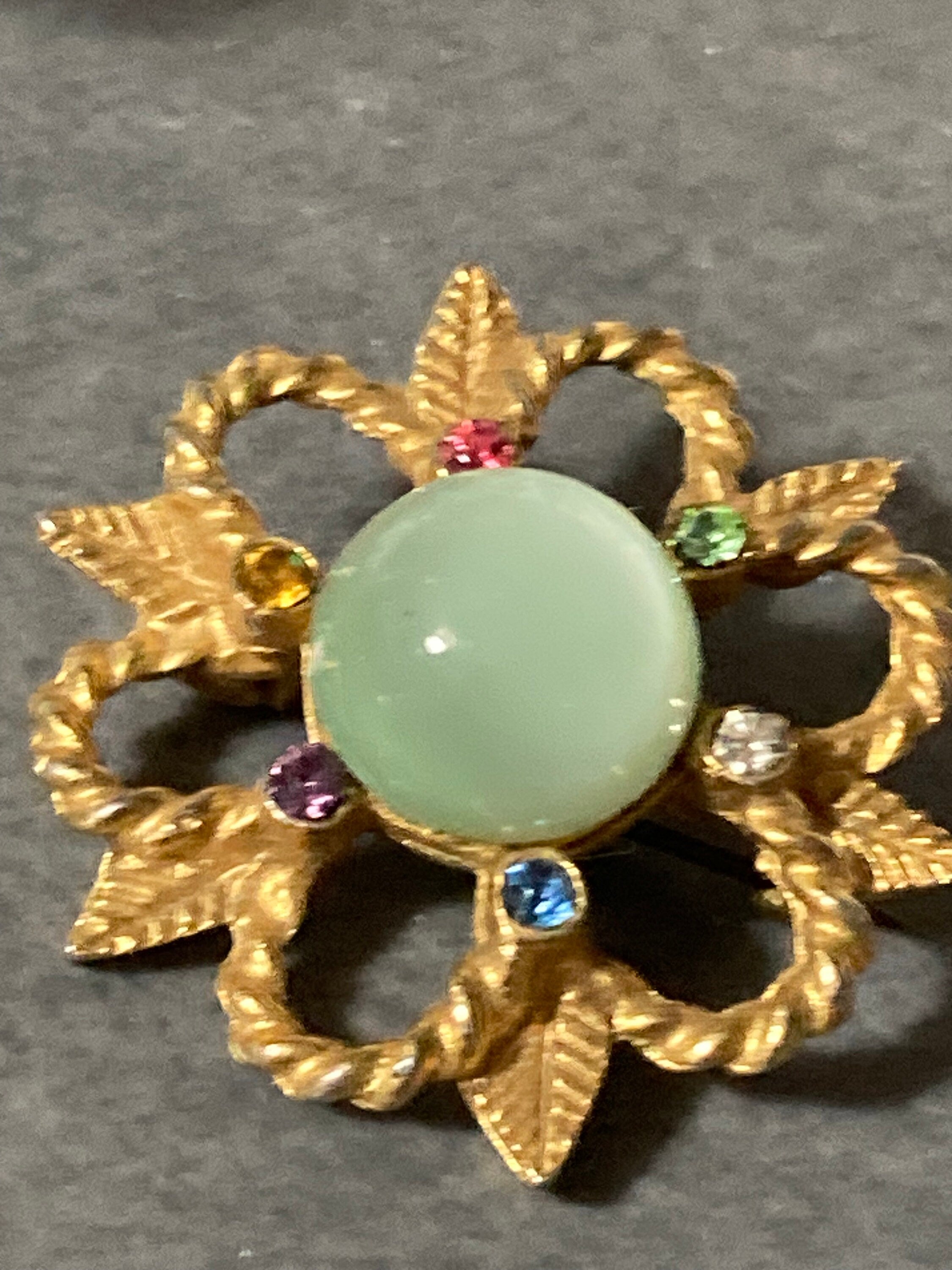 Small art deco rainbow diamanté paste and soft green cabochon brooch 3cm