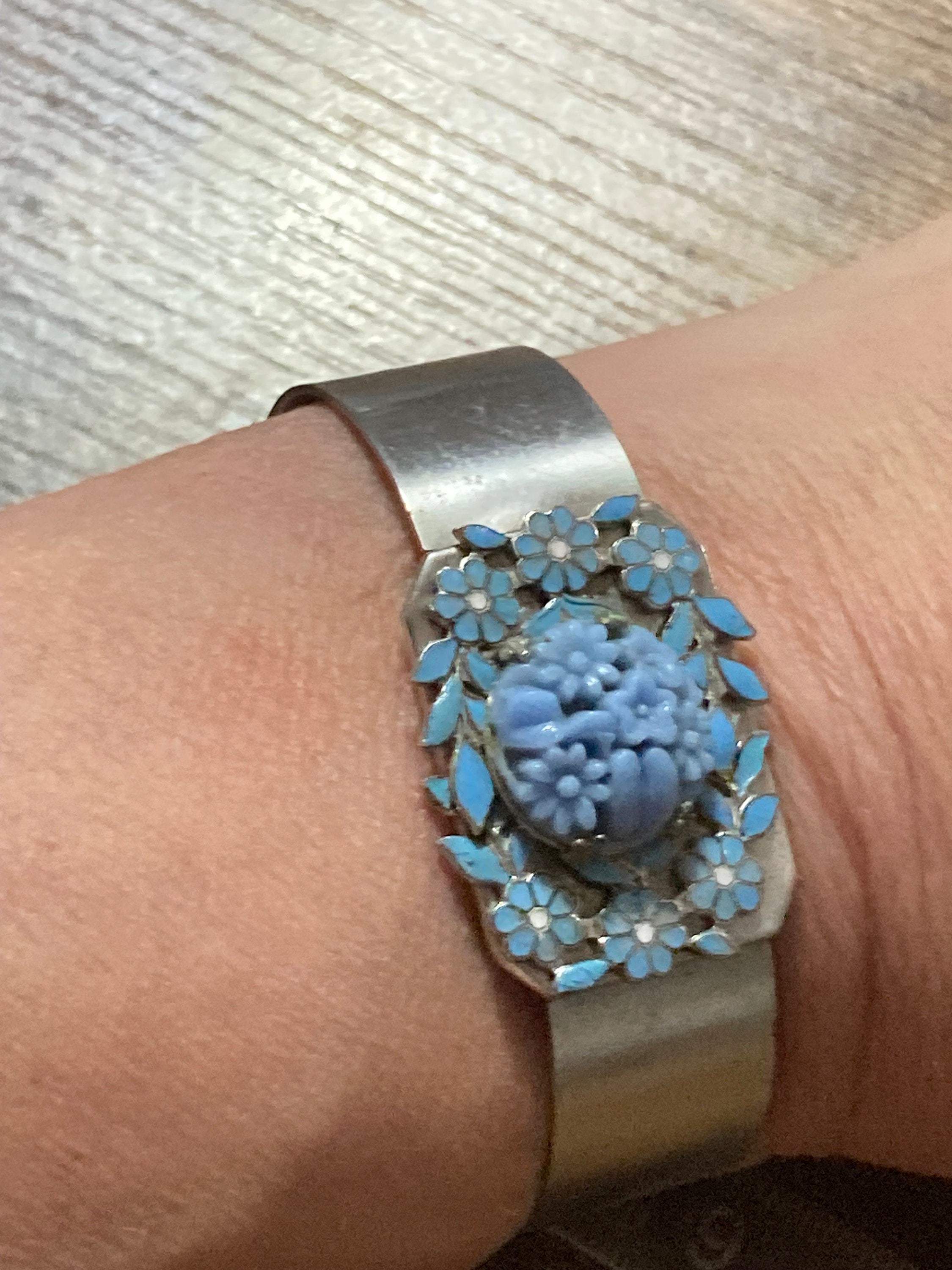 Carved blue glass and enamel floral cabochon wide stainless steel bangle 1970s modernist