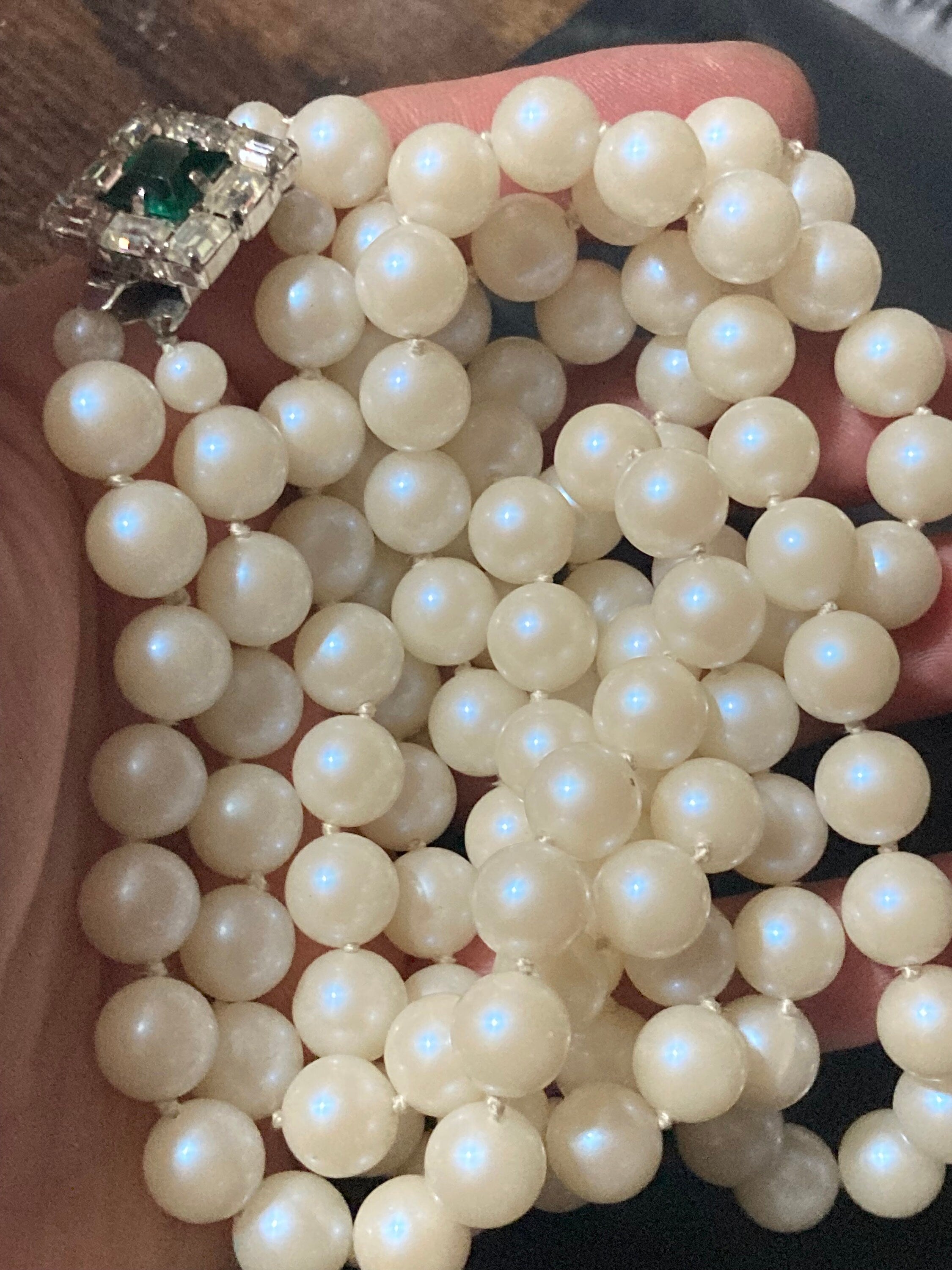 Vintage white faux pearl double strand necklace with emerald paste clasp
